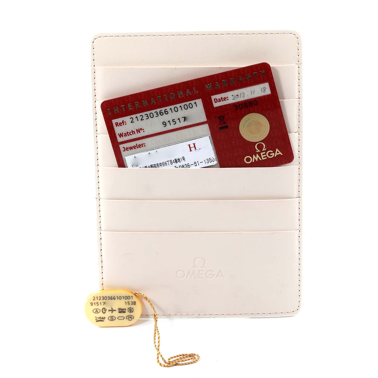 The image shows an Omega Seamaster 212.30.36.61.01.001 Men's Stainless Steel Black Dial 212.30.36.61.01.001 Men's Stainless Steel Black Dial warranty card and hang tag, presented in a cardholder with the Omega logo.