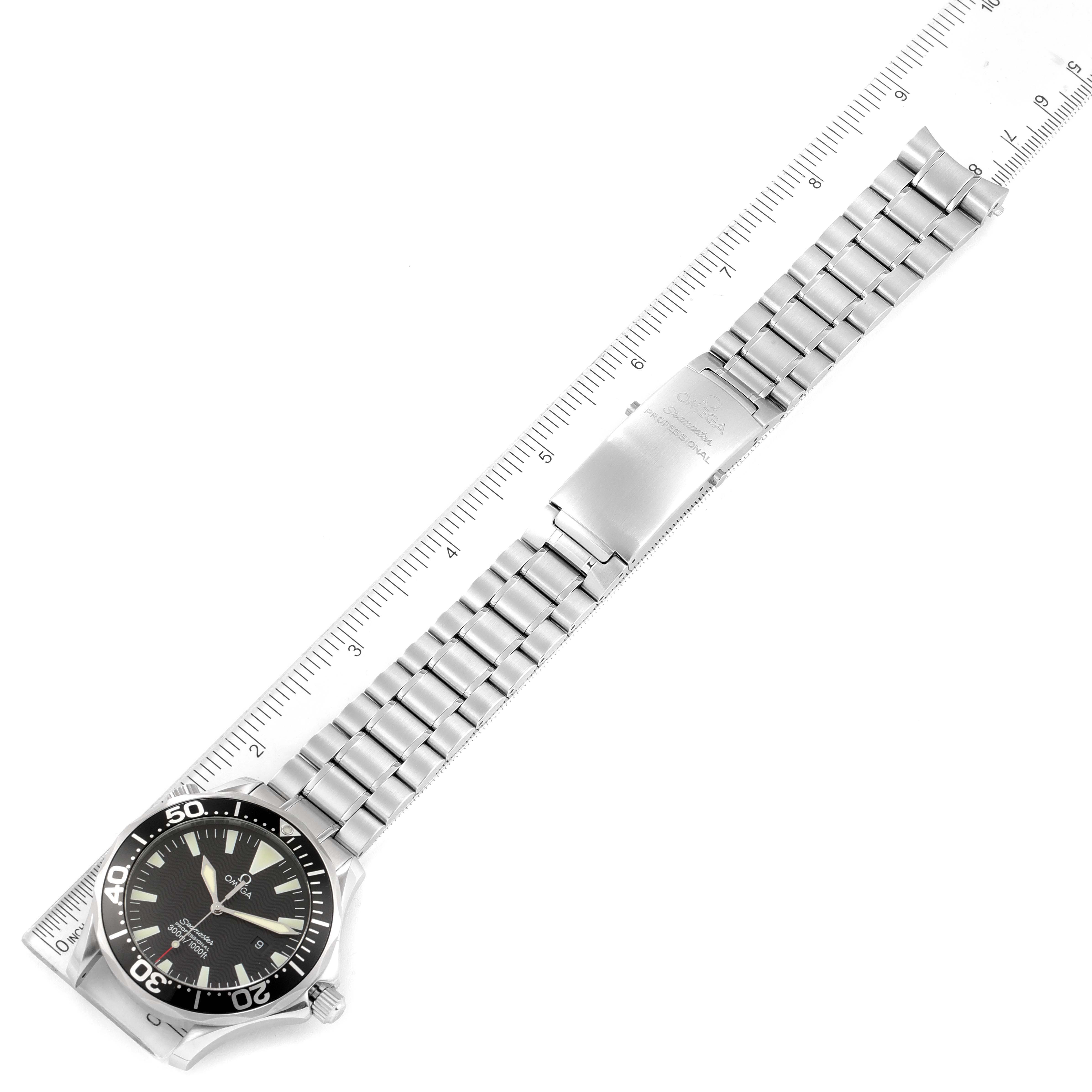 The image shows an Omega Seamaster 2264.50.00 Men's Stainless Steel Black Dial 2264.50.00 Men's Stainless Steel Black Dial watch with a full view including the bezel, face, and entire bracelet against a ruler background.