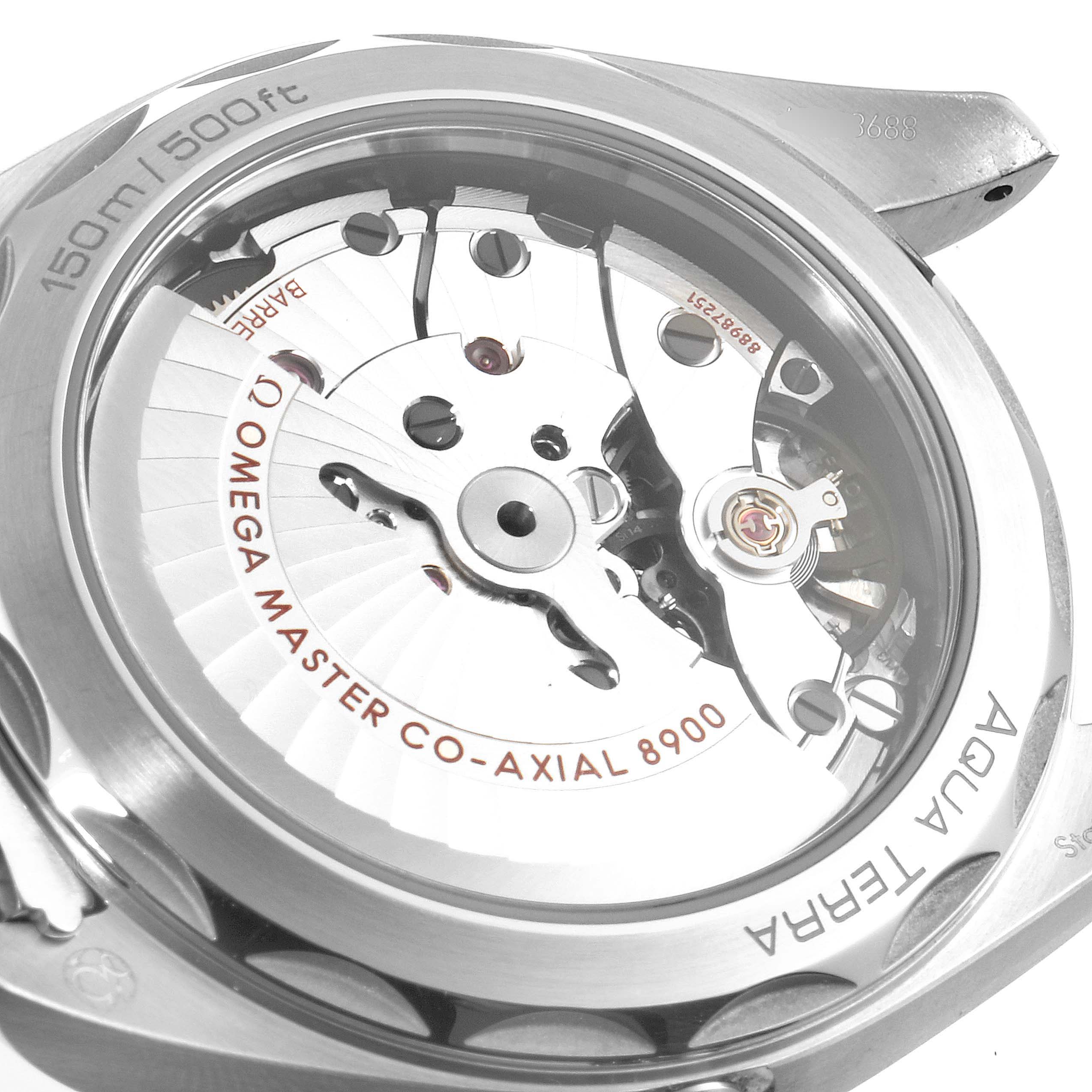 The image shows the case back and the movement of the Omega Aqua Terra 220.10.41.21.01.001 Men's Stainless Steel Black Dial 220.10.41.21.01.001 Men's Stainless Steel Black Dial watch, highlighting the Master Co-Axial 8900 movement.