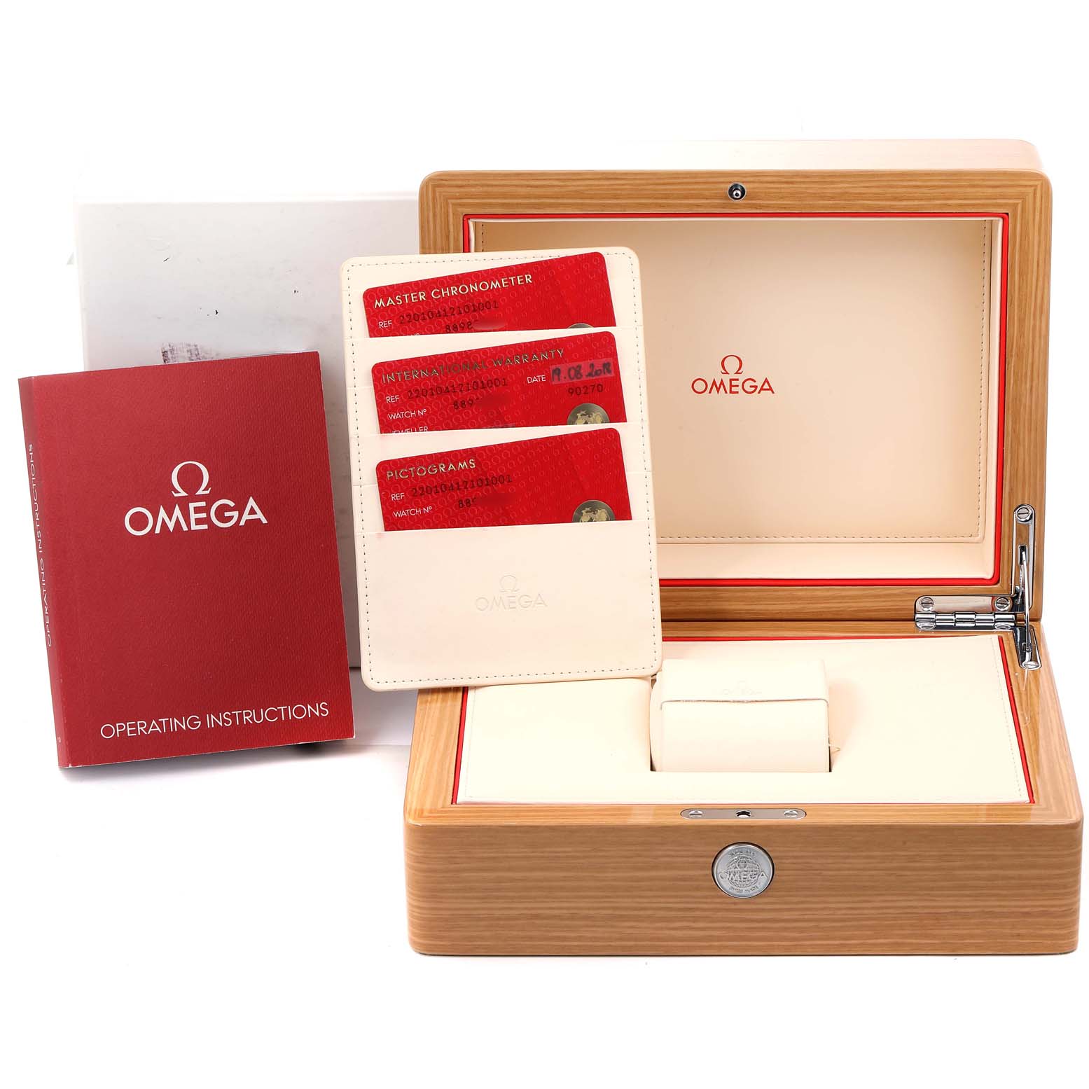 This image shows the packaging and accessories for the Omega Aqua Terra 220.10.41.21.01.001 Men's Stainless Steel Black Dial 220.10.41.21.01.001 Men's Stainless Steel Black Dial watch, including the box, operating instructions, and warranty cards.