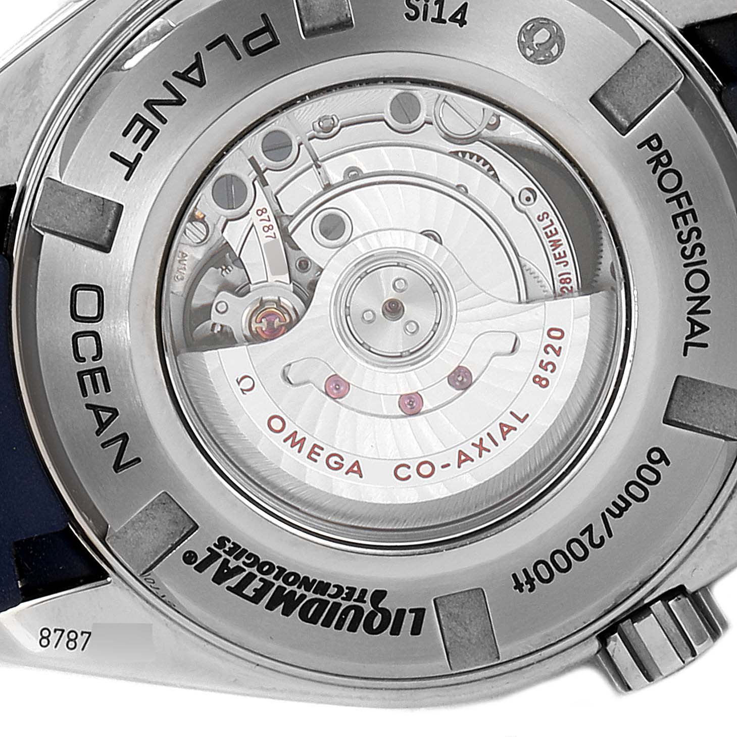 The image shows the back view of an Omega Planet Ocean 232.92.38.20.03.001 Men's Titanium Blue Dial 232.92.38.20.03.001 Men's Titanium Blue Dial watch, highlighting the co-axial movement mechanism and inscriptions.