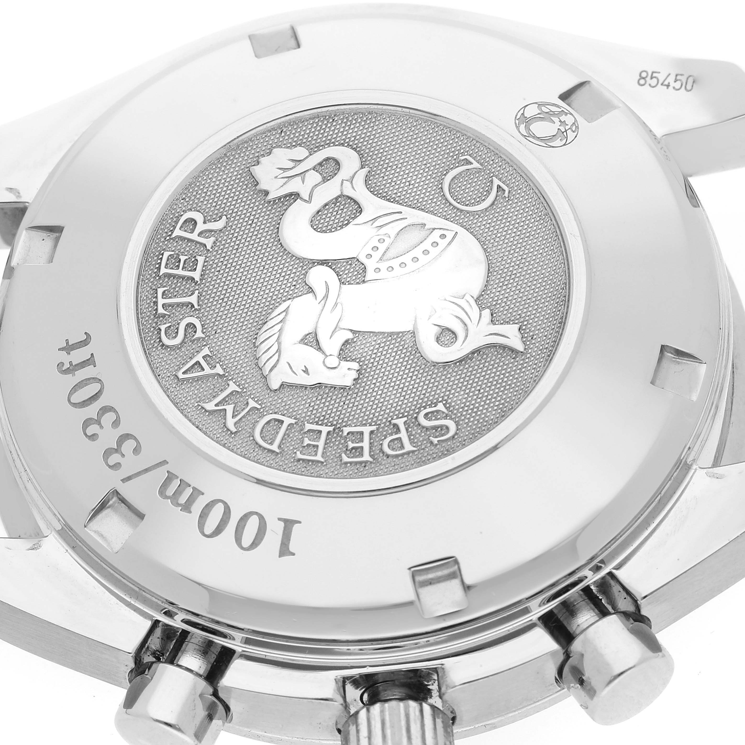 The image shows a close-up of the back case and pushers of an Omega Speedmaster 3210.50.00 Men's Stainless Steel Black Dial 3210.50.00 Men's Stainless Steel Black Dial watch.