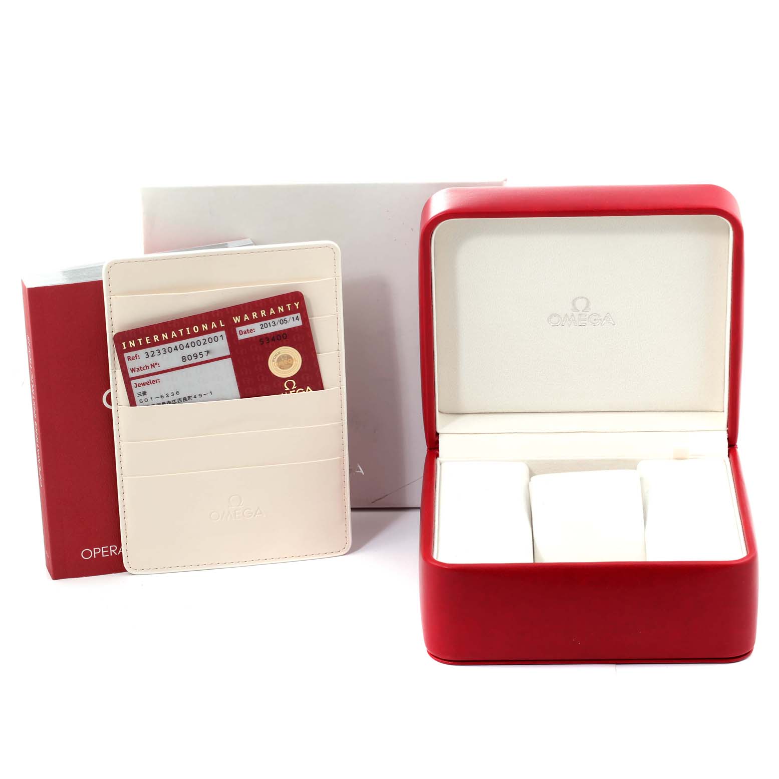 The image shows an Omega Speedmaster 323.30.40.40.02.001 Men's Stainless Steel White Dial 323.30.40.40.02.001 Men's Stainless Steel White Dial watch box, an international warranty card, and an operation manual.