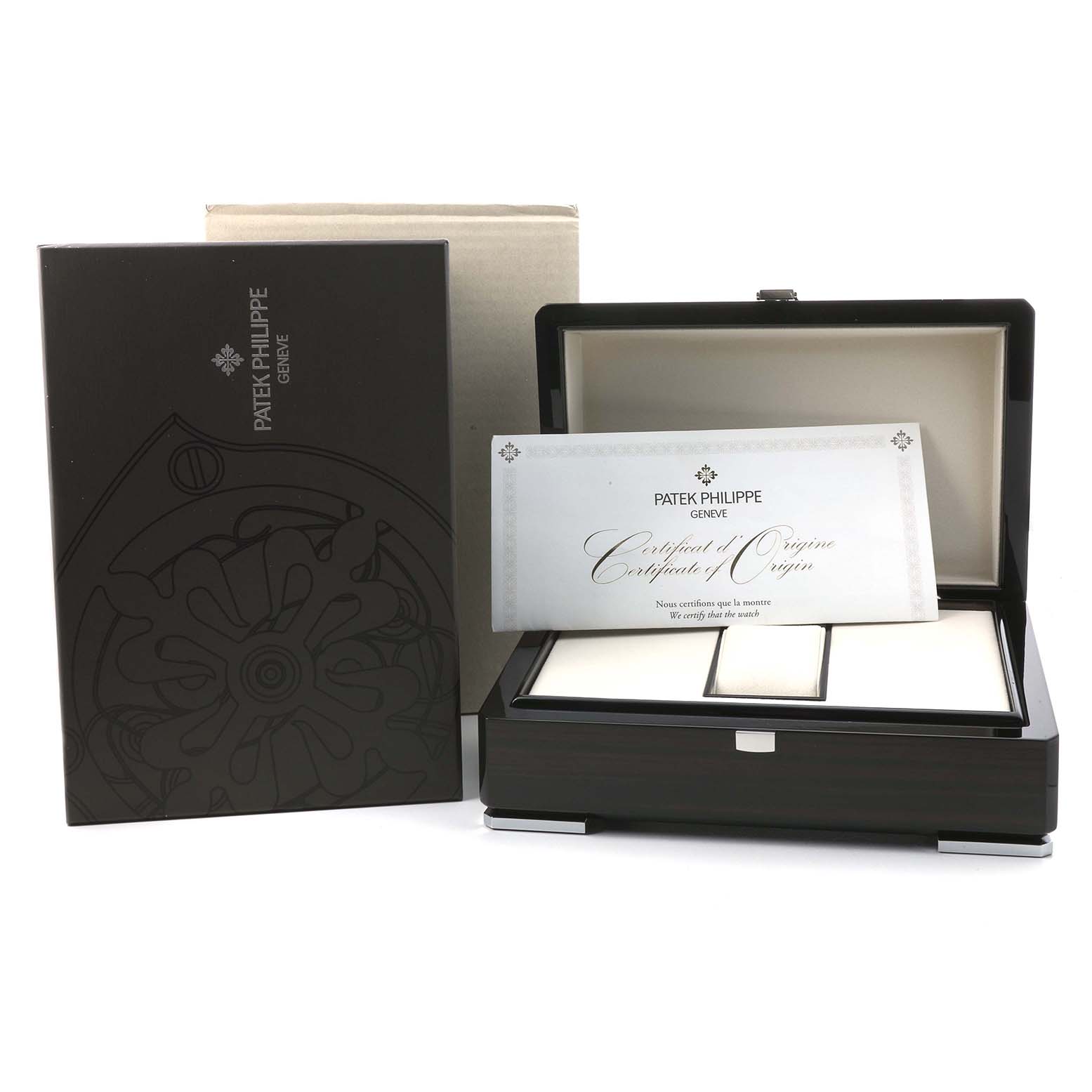 The image shows a Patek Philippe Complications 5960 Men's White Gold Blue Dial watch box, certificate, and packaging at a front angle.