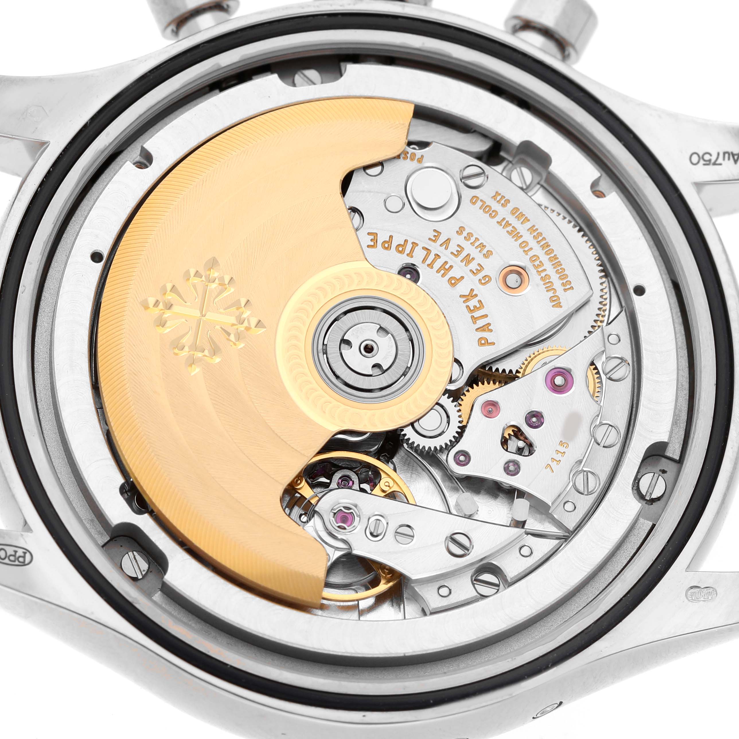 This image shows the movement of a Patek Philippe Complications 5960 Men's White Gold Blue Dial watch, highlighting the rotor and intricate mechanics from a rear angle.