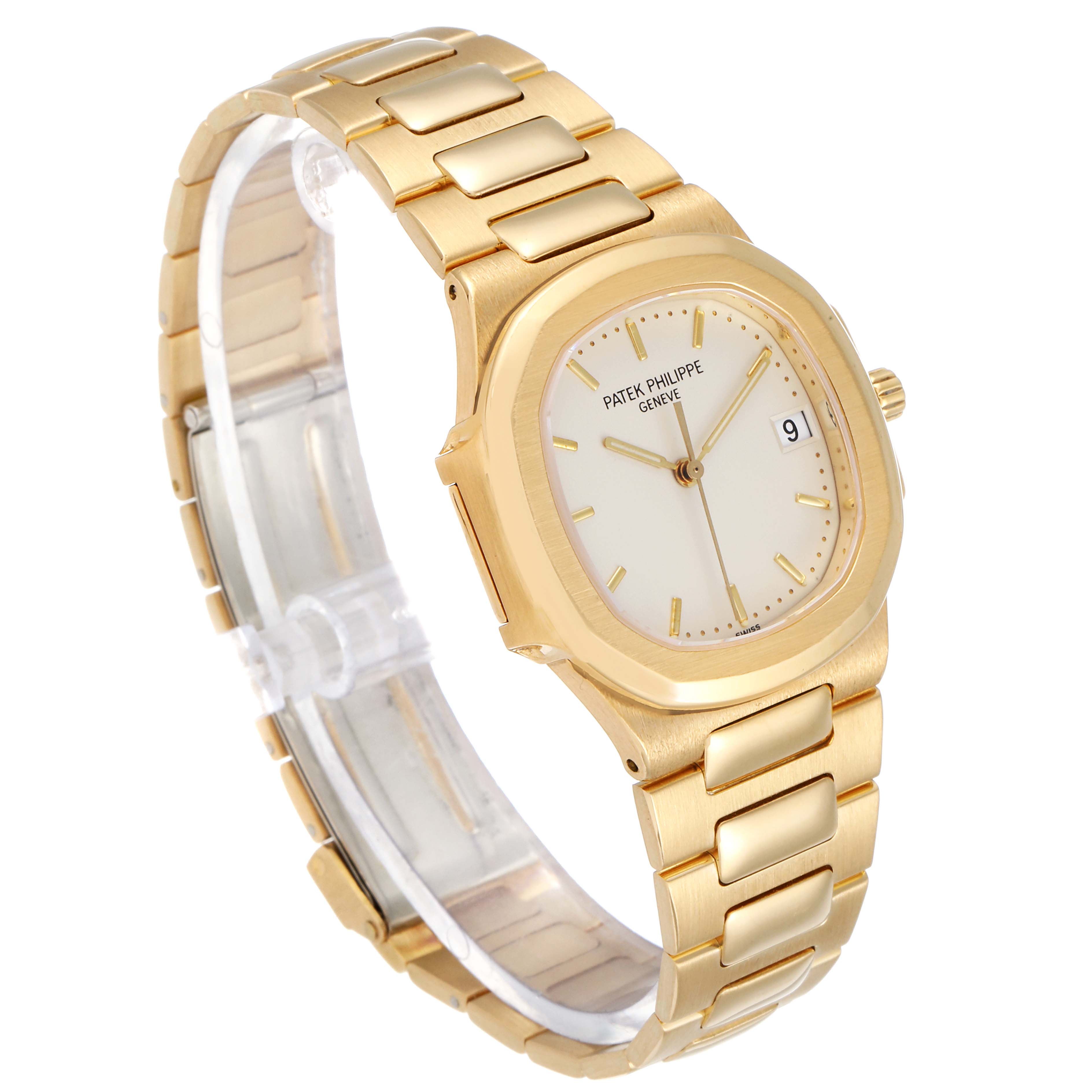 The image shows a front-side angle of a Patek Philippe Nautilus 3900/1J Women's Yellow Gold Silver Dial 3900/1J Women's Yellow Gold Silver Dial watch in gold, displaying its face, bezel, and part of the bracelet.