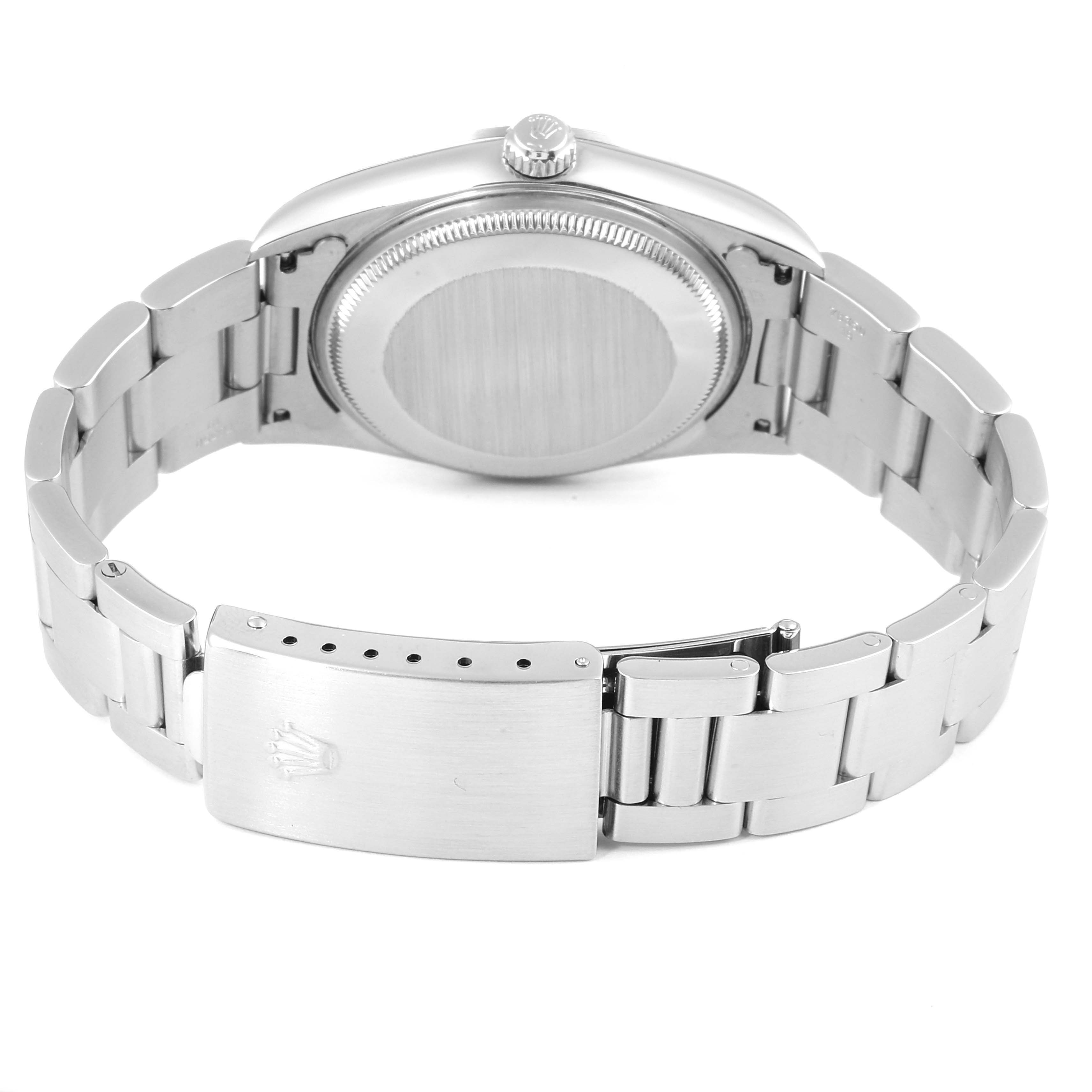 The image shows the back view of a Rolex Air-King 14000 Men's Stainless Steel Black Dial 14000 Men's Stainless Steel Black Dial watch, highlighting its clasp, stainless steel bracelet, and case back.