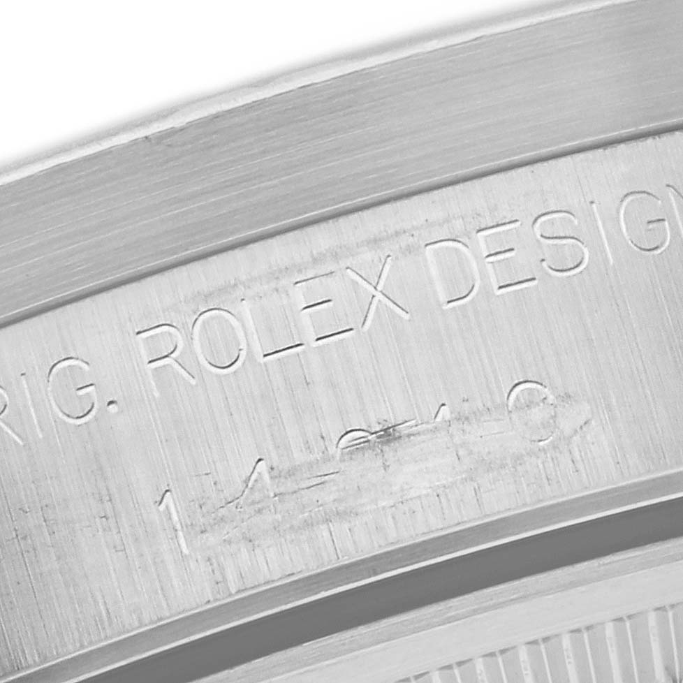 This image shows a close-up angle of the engraving on the case back of a Rolex Air-King 14010 Men's Stainless Steel Pink Dial 14010 Men's Stainless Steel Pink Dial watch.