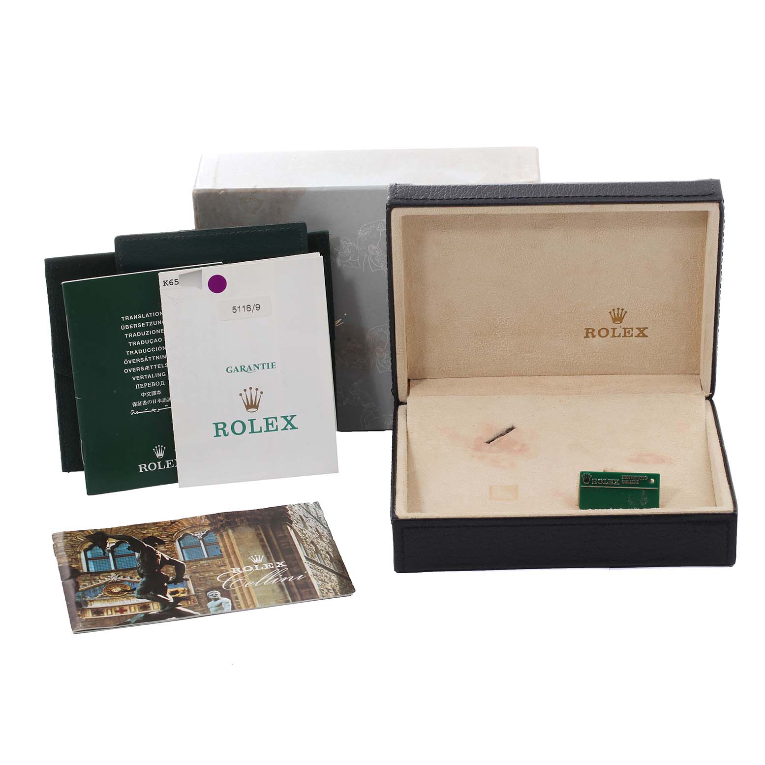 The image shows the box, warranty, and booklets for a Rolex Cellini 5116/9 Men's White Gold Grey Dial 5116/9 Men's White Gold Grey Dial watch, displayed from a front angle.