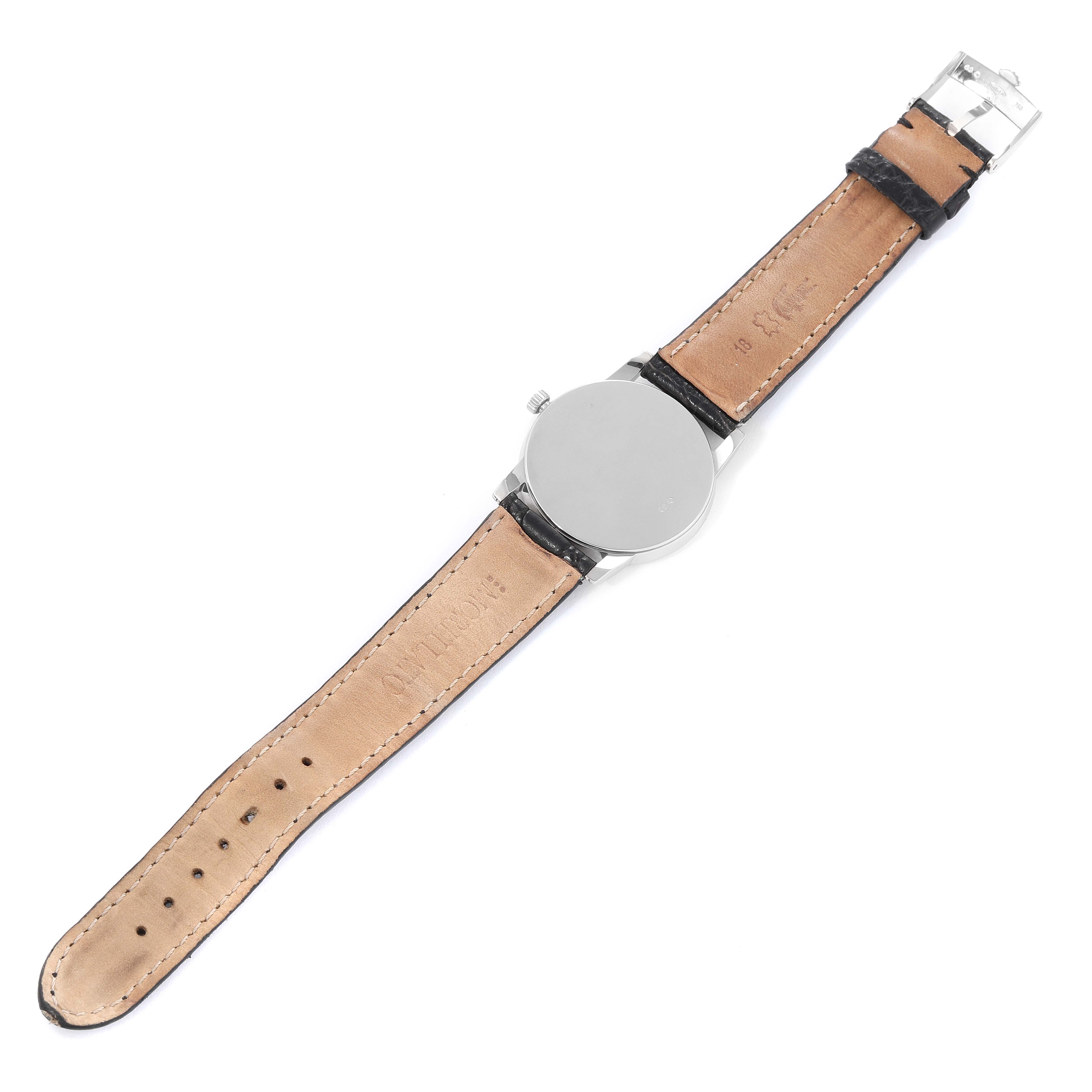 The image shows the back and strap of a Rolex Cellini 5116/9 Men's White Gold Grey Dial 5116/9 Men's White Gold Grey Dial watch, laid flat, highlighting its leather band and case back.