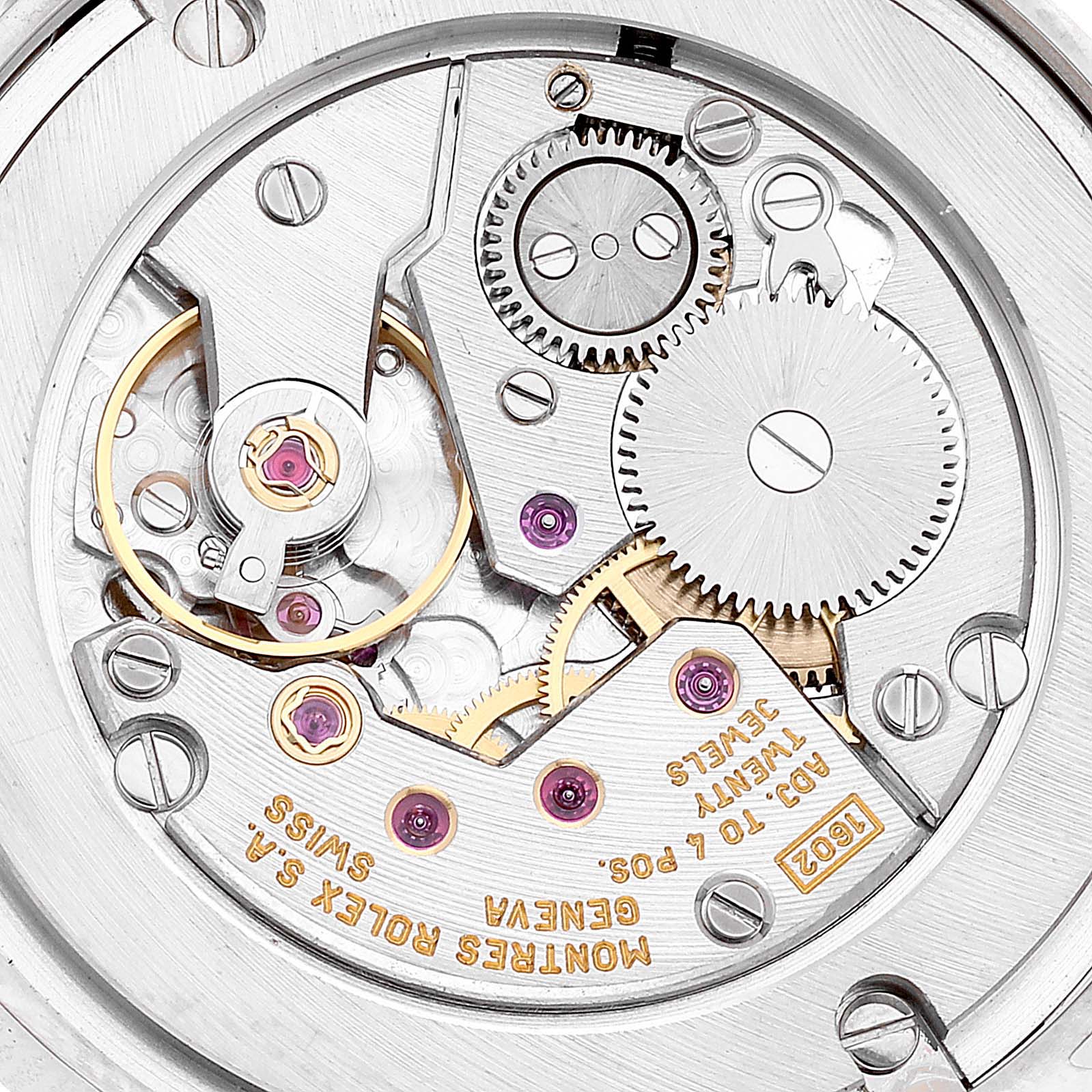 This is a close-up view of the Rolex Cellini 5116/9 Men's White Gold Grey Dial 5116/9 Men's White Gold Grey Dial watch's movement, showing gears, jewels, and engravings.