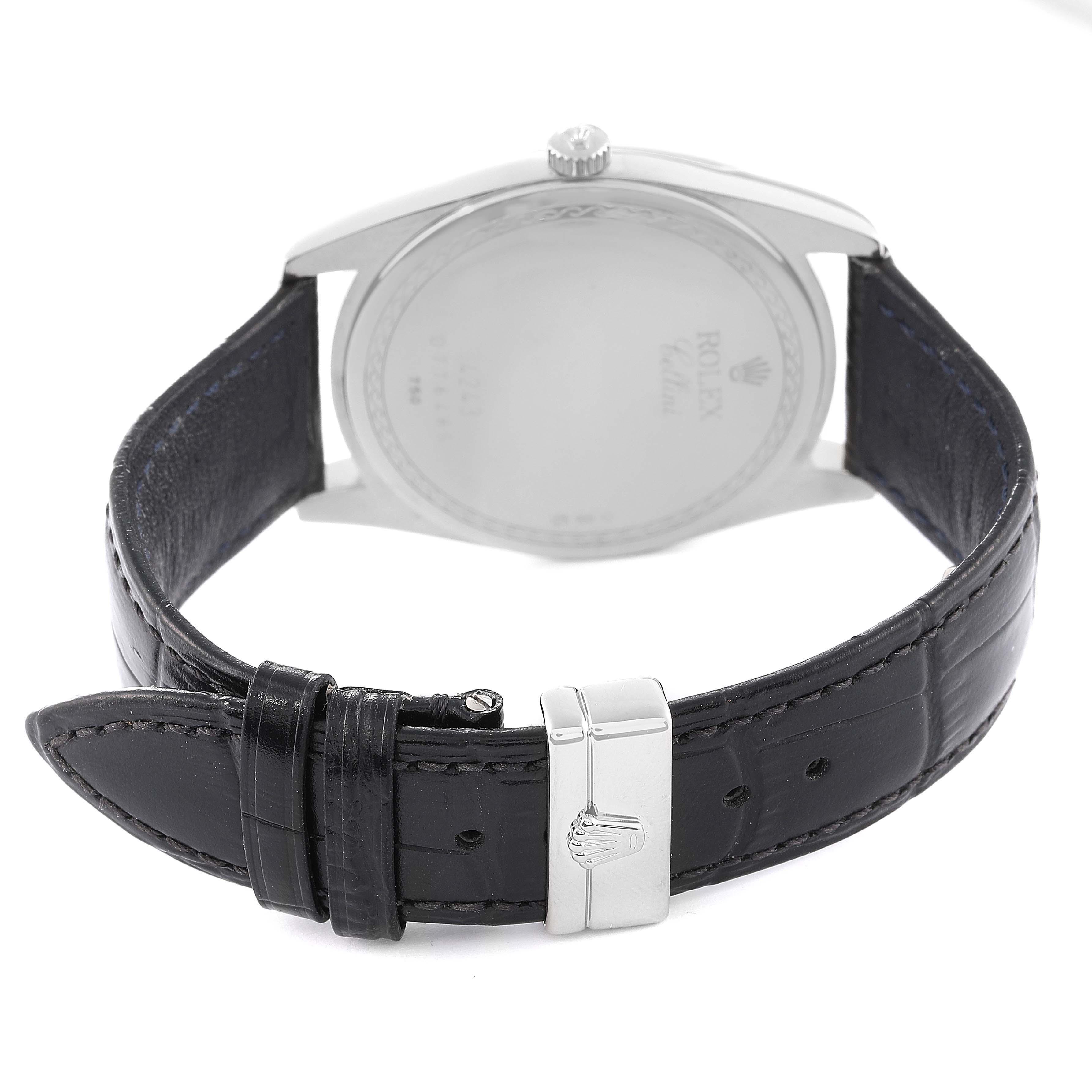 This image shows the back and clasp of a Rolex Cellini 4243 Men's White Gold Black Dial 4243 Men's White Gold Black Dial watch, displaying its leather strap and buckle.
