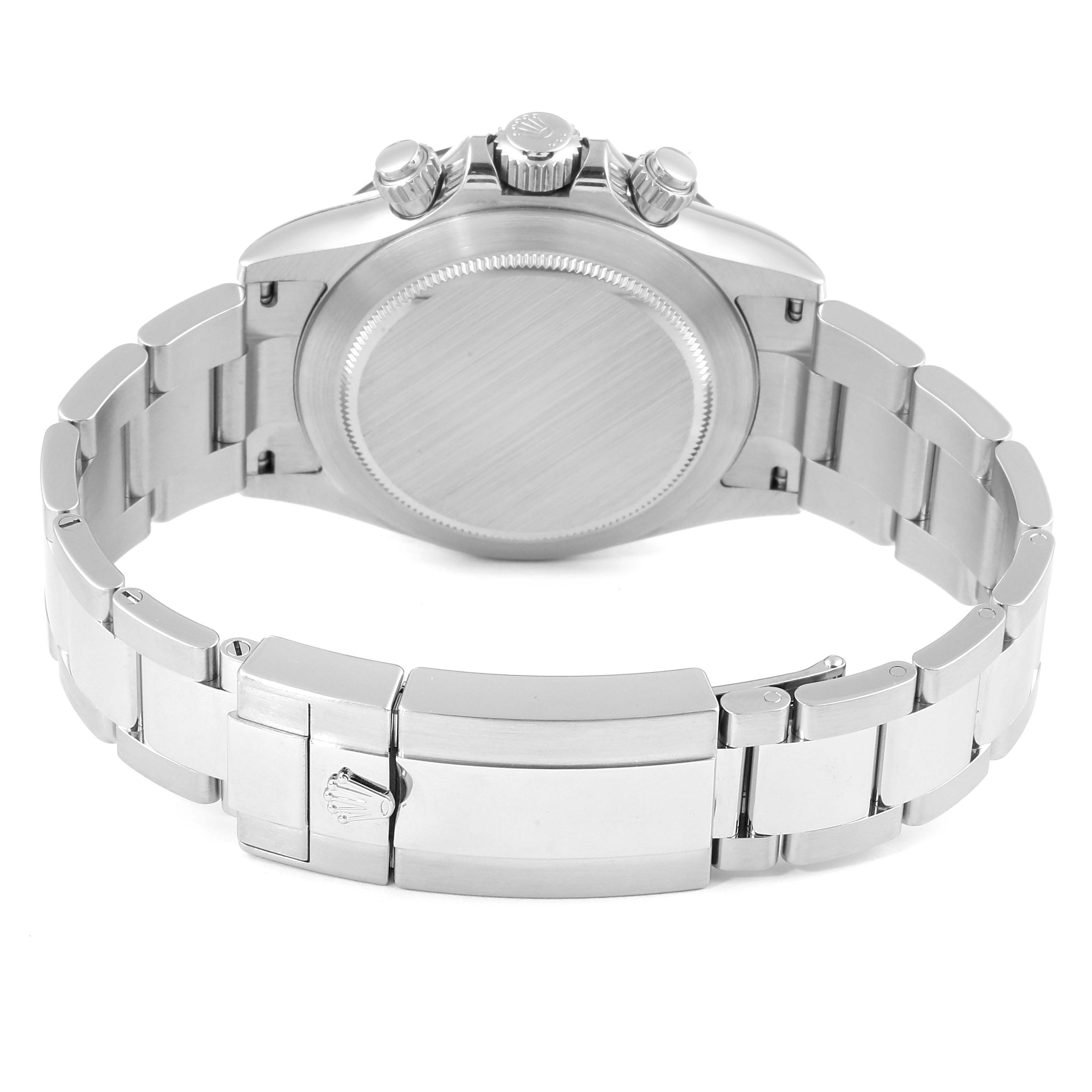 The image shows the back casing, clasp, and part of the bracelet of a Rolex Daytona 116500 Men's Stainless Steel Black Dial 116500 Men's Stainless Steel Black Dial watch from the opposite side of the watch dial.