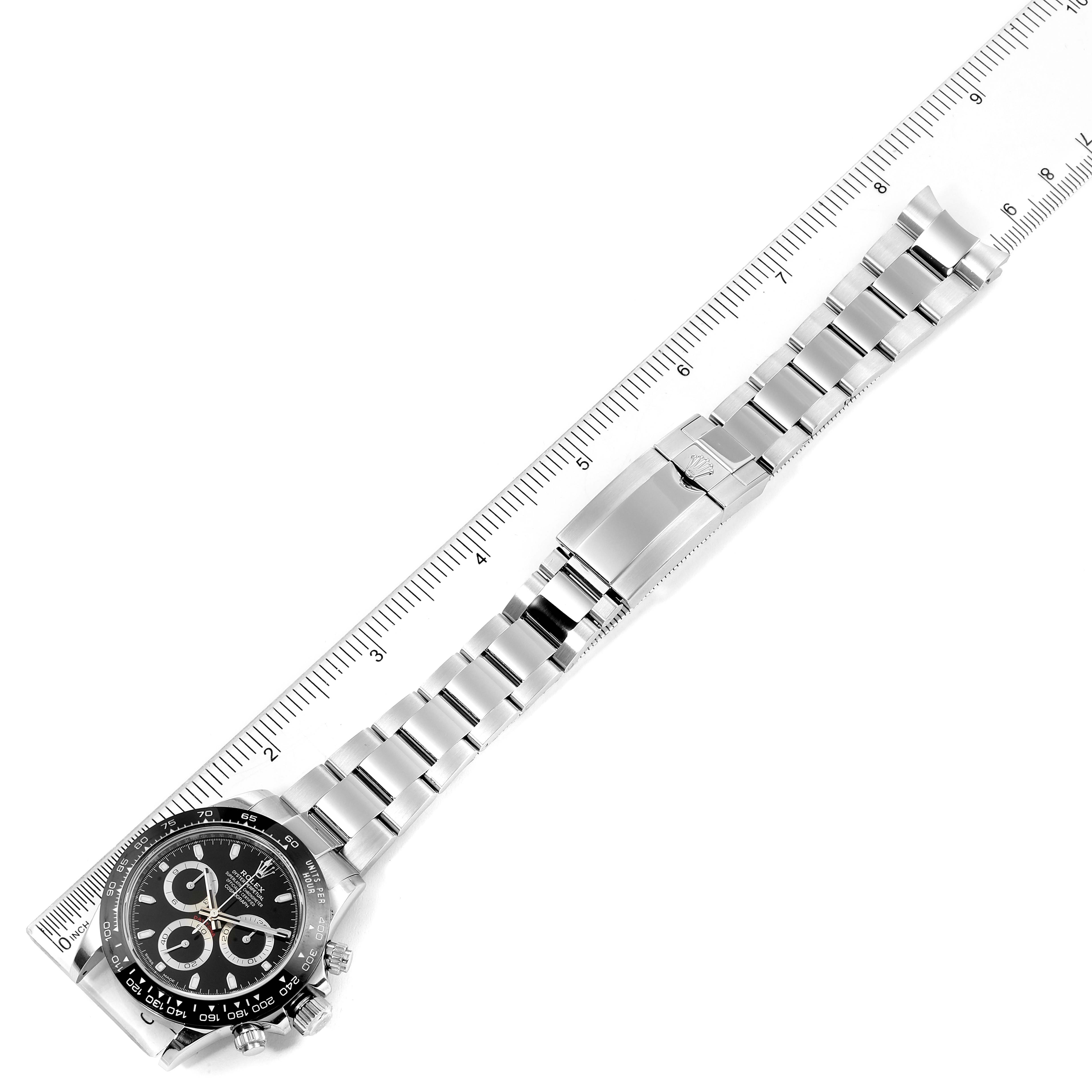 The image shows an overhead view of a Rolex Daytona 116500 Men's Stainless Steel Black Dial 116500 Men's Stainless Steel Black Dial watch, displaying its band, clasp, and dial.