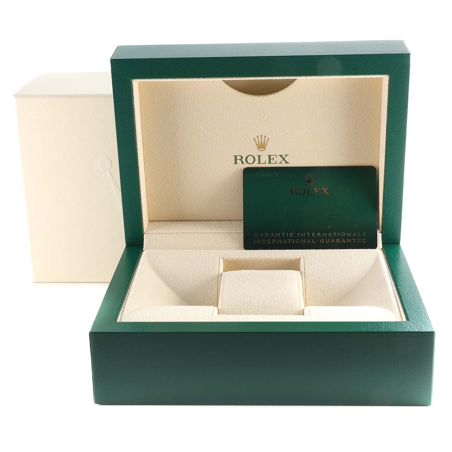 The image shows a green Rolex watch box for the Daytona model, with an international guarantee card inside.