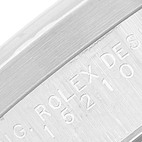 This image shows a close-up of the engraved side of a Rolex Date 15210 Men's Stainless Steel Silver Dial 15210 Men's Stainless Steel Silver Dial model watch.