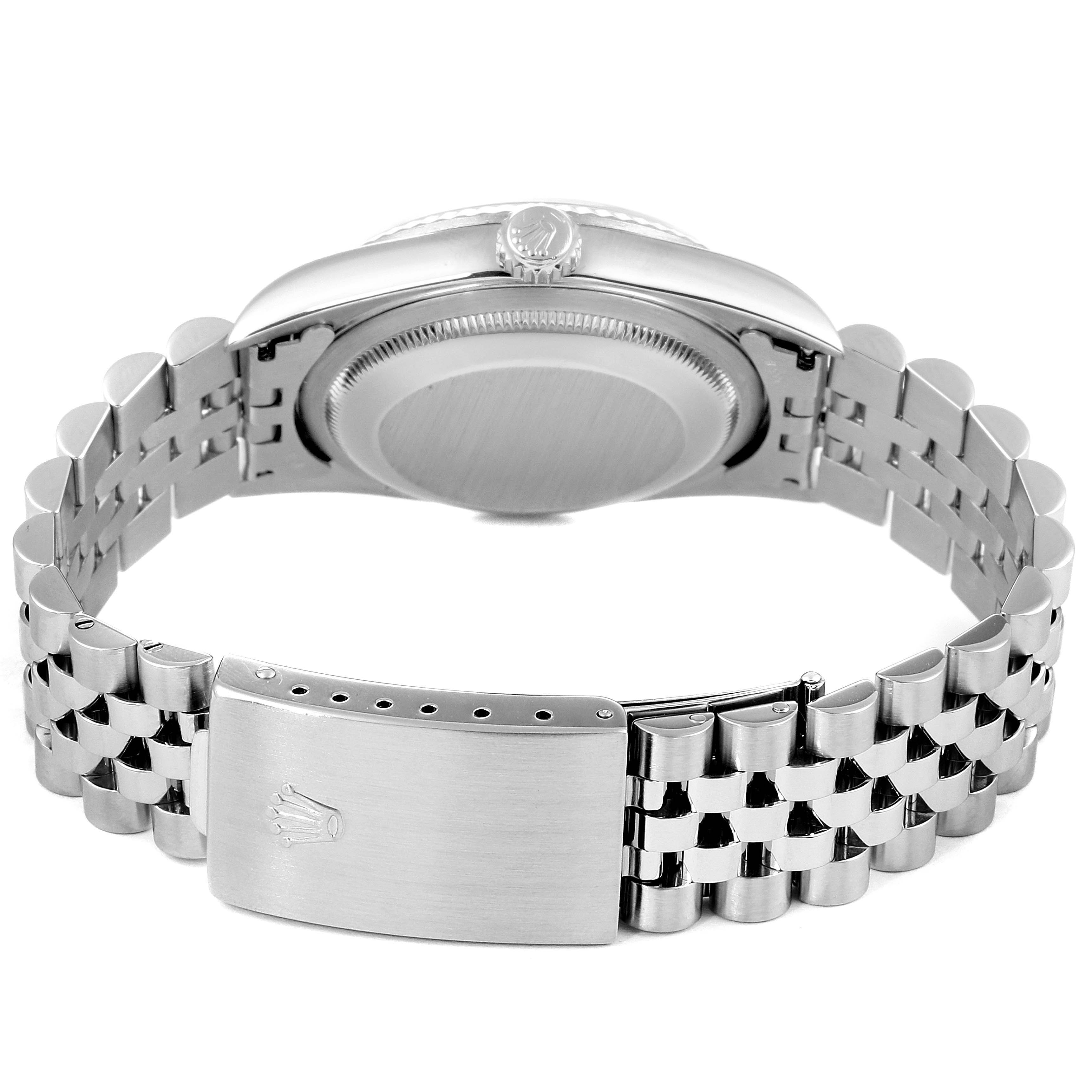 The image shows the back and the bracelet of a Rolex Datejust 16234 Men
s Stainless Steel Blue Dial 16234 Men
s Stainless Steel Blue Dial watch, focusing on the clasp and caseback.