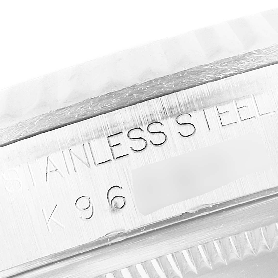 This close-up image shows the stainless steel casing edge and a partially visible bezel of a Rolex Datejust 16234 Men
s Stainless Steel Blue Dial 16234 Men
s Stainless Steel Blue Dial watch.