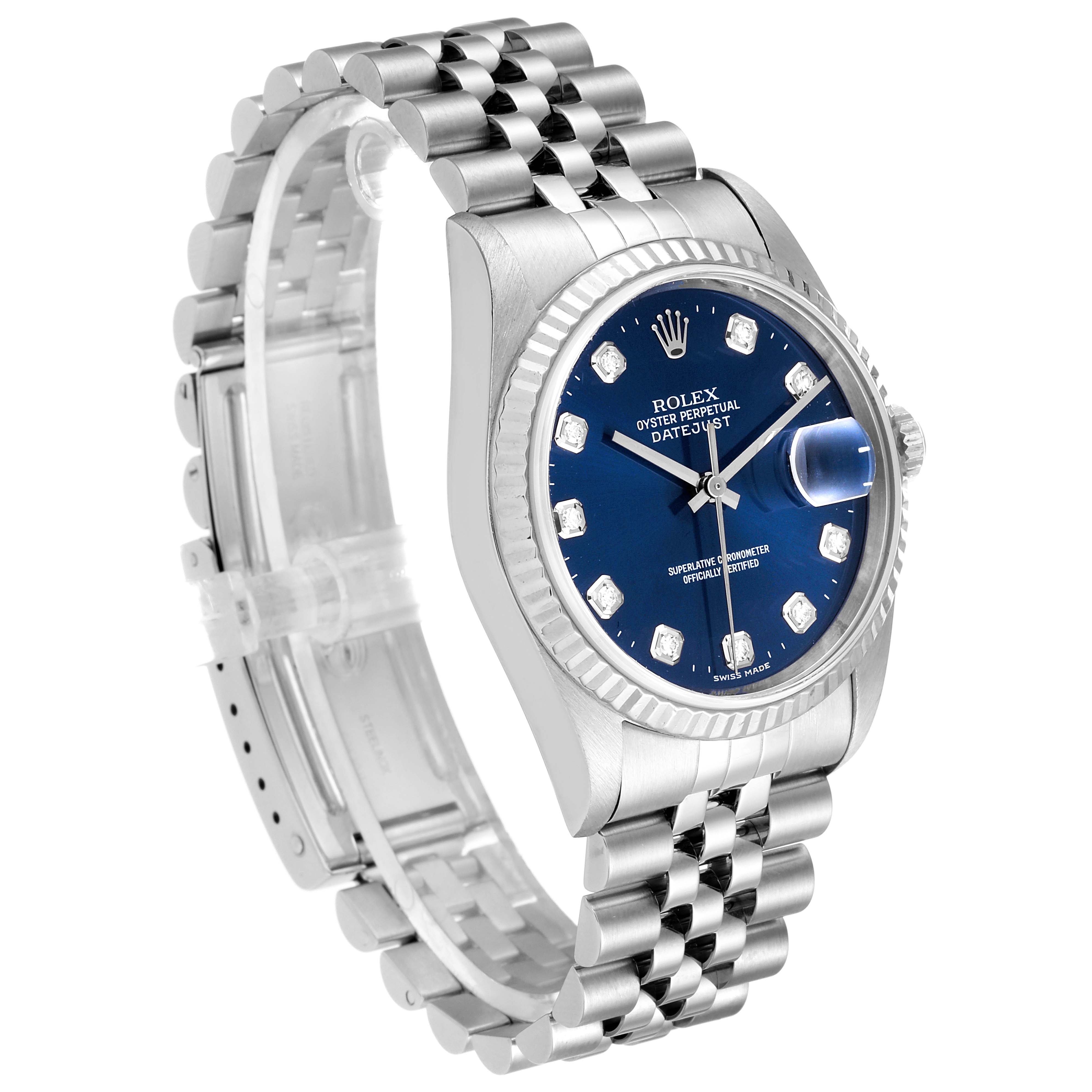 The image shows a Rolex Datejust 16234 Men
s Stainless Steel Blue Dial 16234 Men
s Stainless Steel Blue Dial watch from an angled side view, highlighting its blue dial, stainless steel case, fluted bezel, and jubilee bracelet.