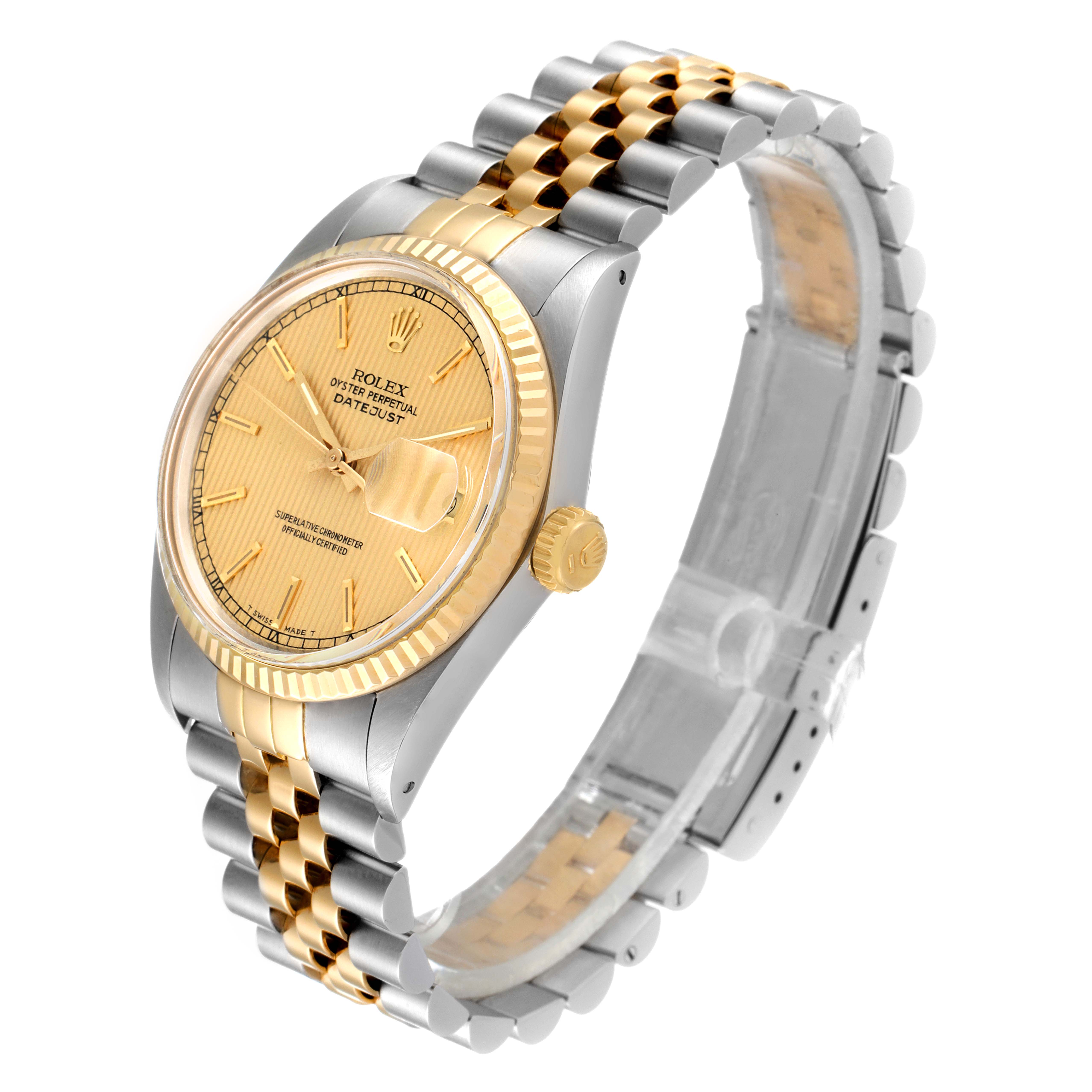 The image shows a Rolex Datejust 16013 Men
s Steel and Gold (two tone) Champagne Dial 16013 Men
s Steel and Gold (two tone) Champagne Dial watch at a slight angle, displaying the face, bezel, crown, and two-tone bracelet.