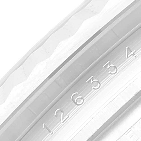 This is a close-up of the fluted bezel and part of the rehaut on a Rolex Datejust 41 126334 Men
s Stainless Steel Grey Dial 126334 Men
s Stainless Steel Grey Dial model.