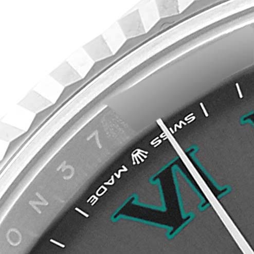 The image shows a close-up of the bezel, part of the date window, and hour markers on a Rolex Datejust 41 126334 Men
s Stainless Steel Grey Dial 126334 Men
s Stainless Steel Grey Dial watch.