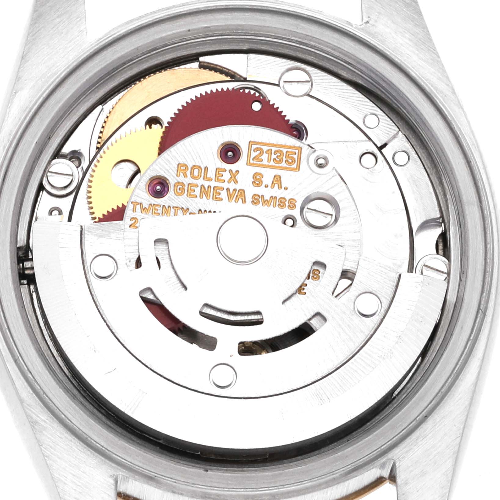 The image shows a close-up view of the movement inside a Rolex Datejust 69173G Women's Steel and Gold (two tone) Champagne Dial 69173G Women's Steel and Gold (two tone) Champagne Dial watch, featuring its intricate gears and "Rolex S.A. Geneva Swiss" inscription.