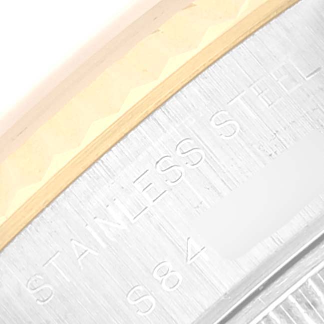 The image shows a close-up view of the case and bezel of a Rolex Datejust 69173 Women's Steel and Gold (two tone) Blue Dial 69173 Women's Steel and Gold (two tone) Blue Dial watch, highlighting the "Stainless Steel" engraving.