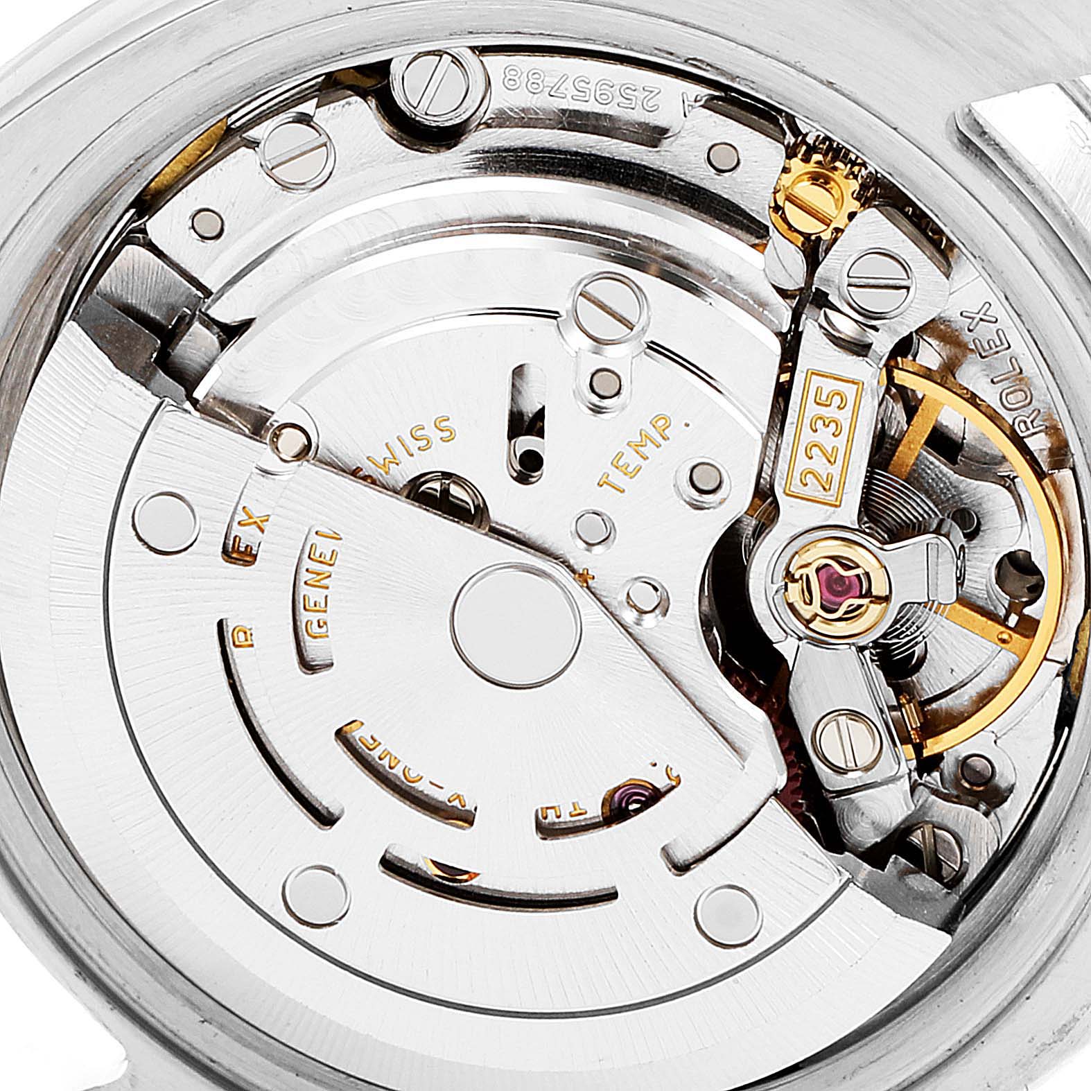 This image shows a close-up of the internal movement mechanism of the Rolex Datejust 179171 Women's Rose Gold Pink Dial 179171 Women's Rose Gold Pink Dial model, primarily depicting gears and screws.