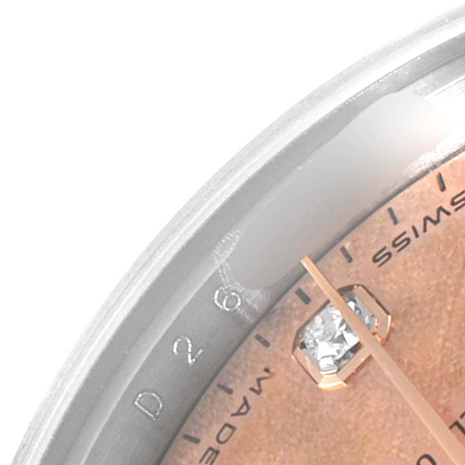 The image shows a close-up of the dial and bezel of a Rolex Datejust 179171 Women's Steel and Gold (two tone) Mother of Pearl Dial 179171 Women's Steel and Gold (two tone) Mother of Pearl Dial, focusing on the "SWISS MADE" text and minute markers.