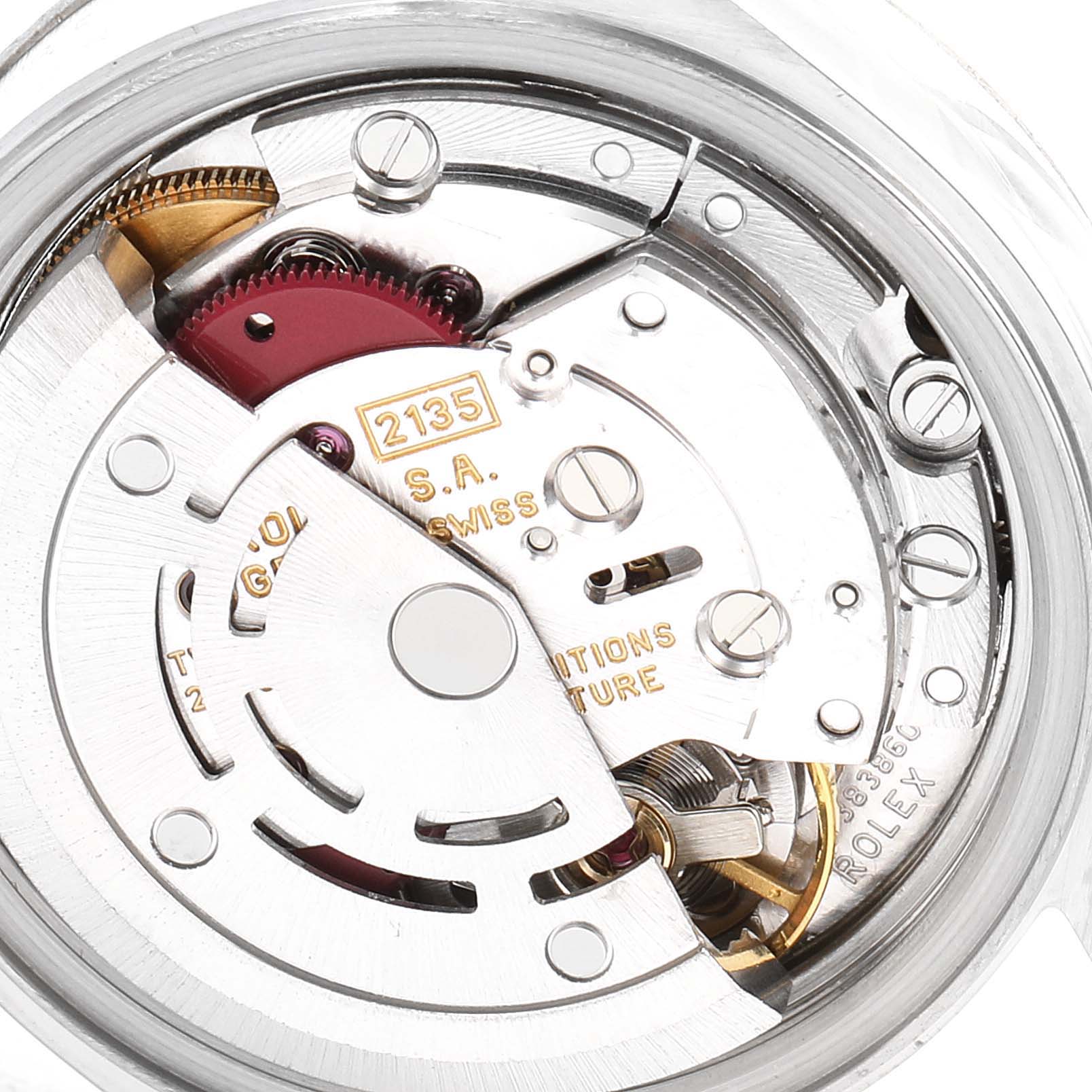 The image shows the internal movement mechanism of the Rolex Datejust 69174 Women's Stainless Steel Pink Dial 69174 Women's Stainless Steel Pink Dial model, specifically the caliber 2135.