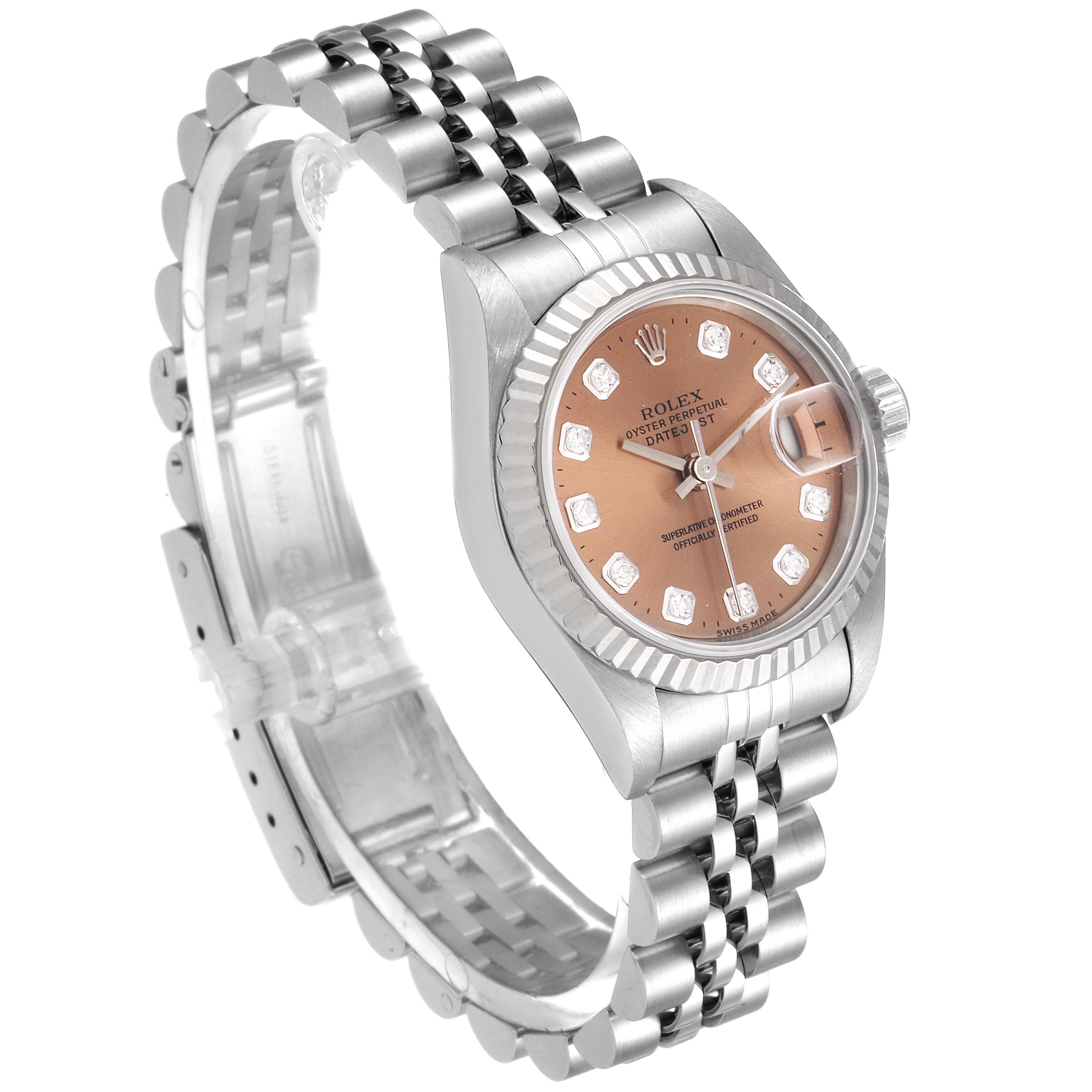 The Rolex Datejust 69174 Women's Stainless Steel Pink Dial 69174 Women's Stainless Steel Pink Dial watch is shown at an angle revealing its jubilee bracelet, dial, case, and fluted bezel.