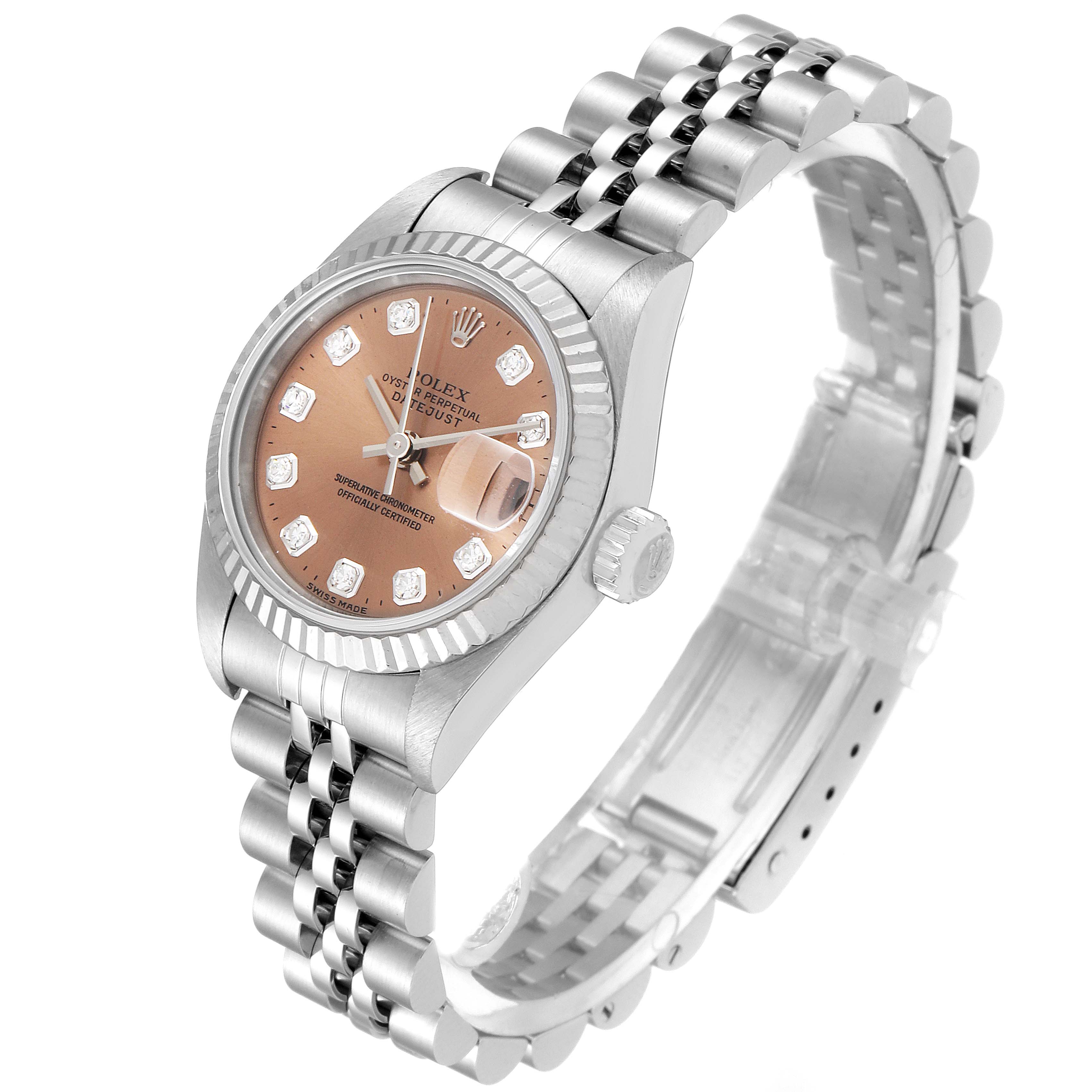 This Rolex Datejust 69174 Women's Stainless Steel Pink Dial 69174 Women's Stainless Steel Pink Dial watch is shown at an angle displaying the watch face, crown, bezel, and a portion of the bracelet.