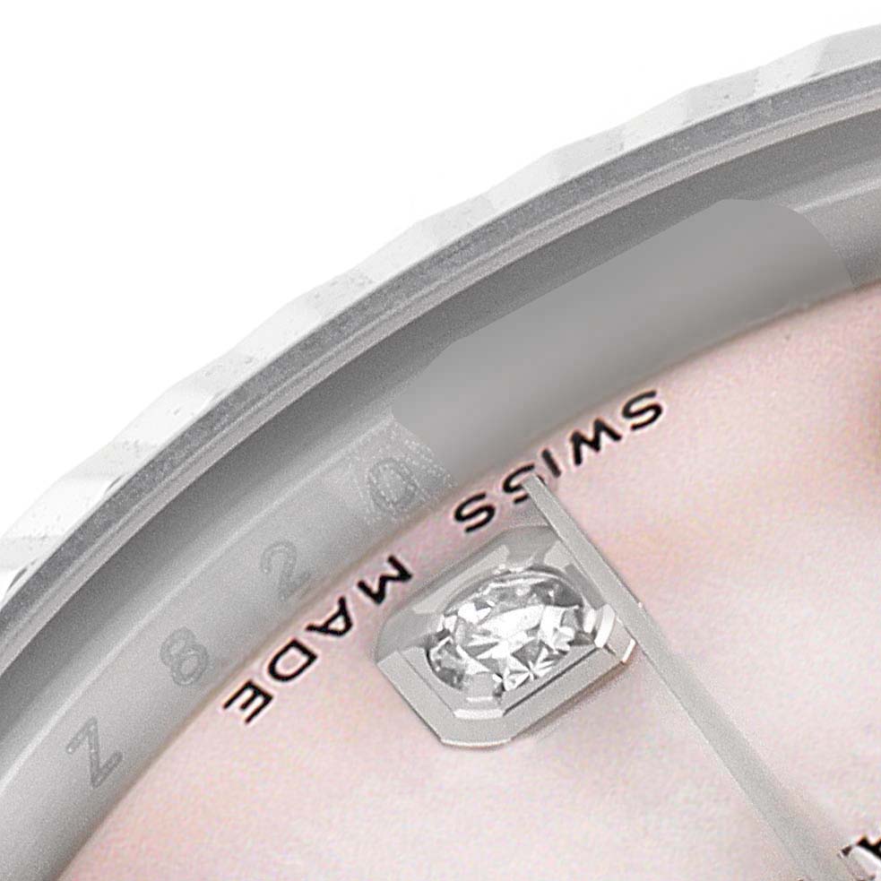 The image shows a close-up angled view of a Rolex Mid-Size 178274 Women
s Stainless Steel Mother of Pearl Dial 178274 Women
s Stainless Steel Mother of Pearl Dial watch, focusing on the diamond marker, bezel, and part of the dial with 
Swiss Made
 text.