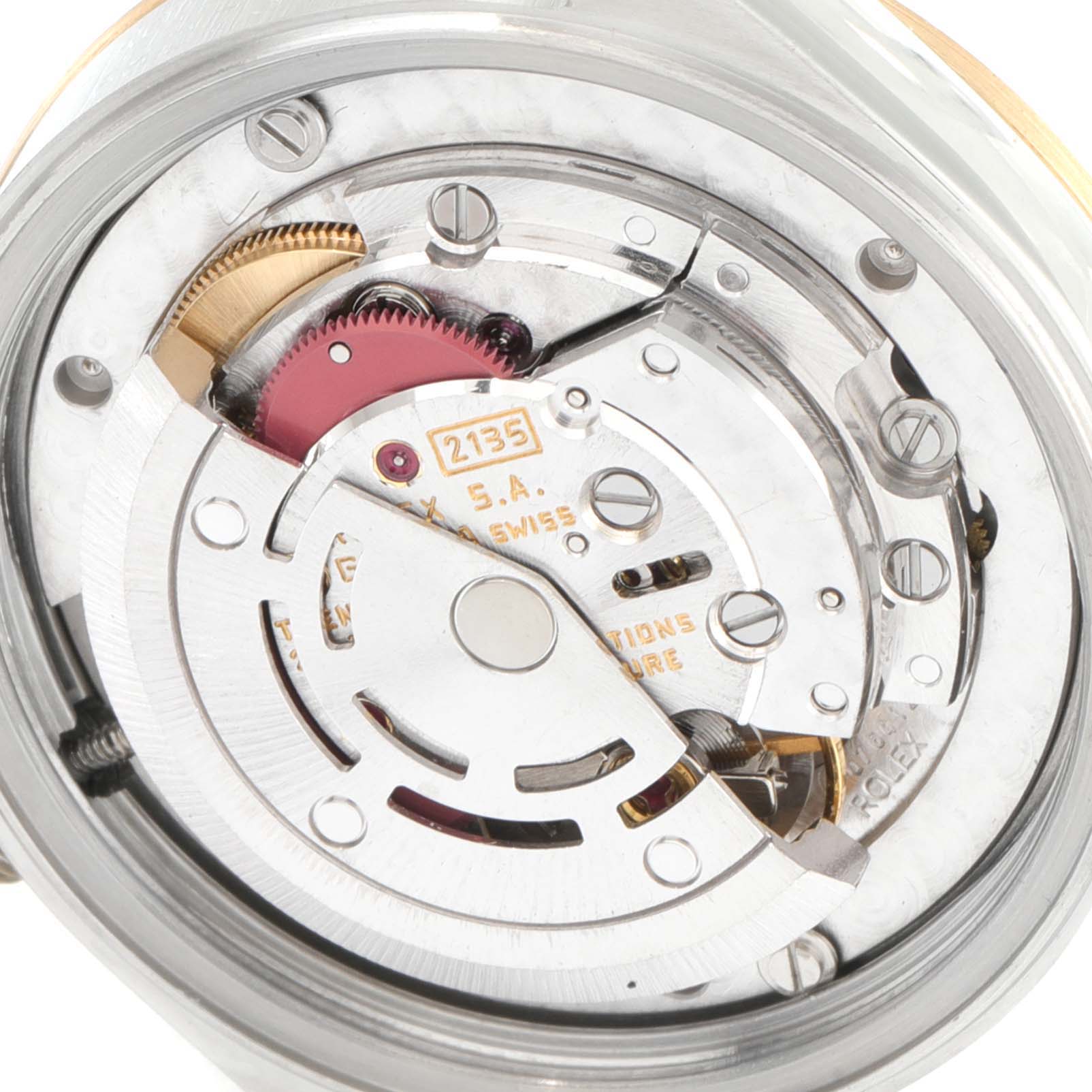 This image shows a close-up view of the internal mechanism (movement) of a Rolex Mid-Size 68273 Women
s Steel and Gold (two tone) White Dial 68273 Women
s Steel and Gold (two tone) White Dial model watch.