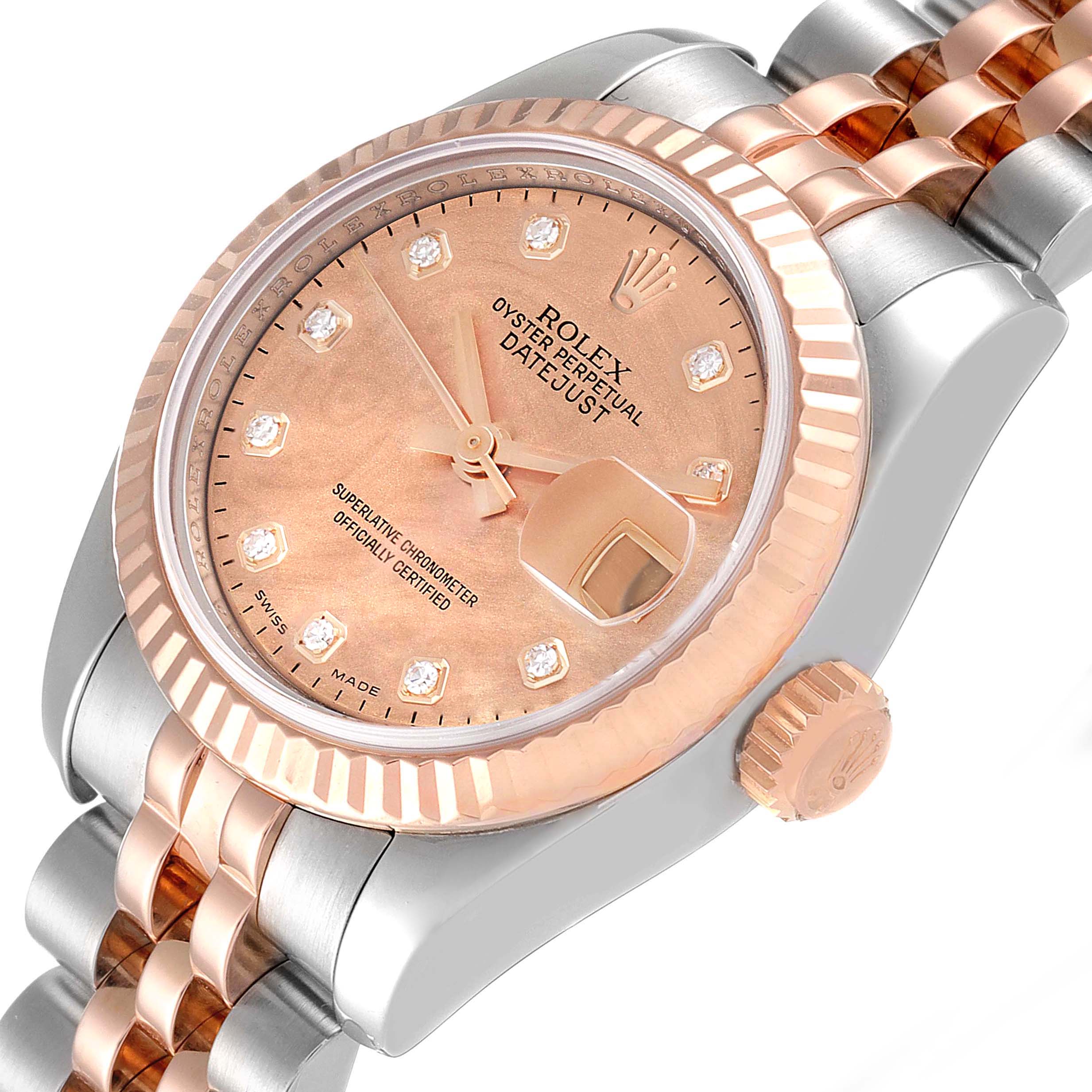 The image shows a Rolex Datejust 179171 Women's Steel and Gold (two tone) Mother of Pearl Dial 179171 Women's Steel and Gold (two tone) Mother of Pearl Dial watch from an angled close-up, focusing on the dial, bezel, and part of the bracelet.