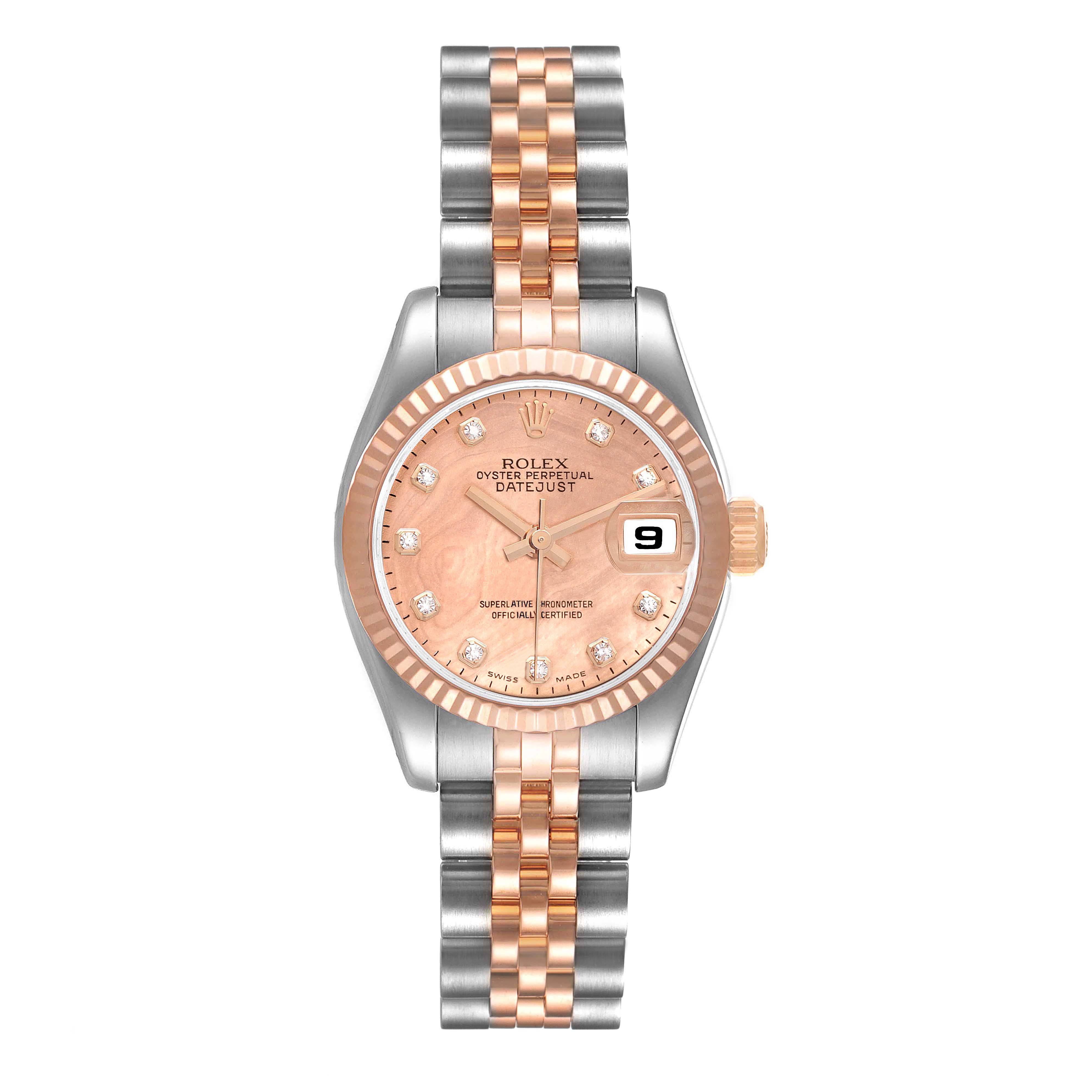 The Rolex Datejust 179171 Women's Steel and Gold (two tone) Mother of Pearl Dial 179171 Women's Steel and Gold (two tone) Mother of Pearl Dial watch is shown from a top-down angle, displaying its two-tone bracelet, champagne dial, and fluted bezel.