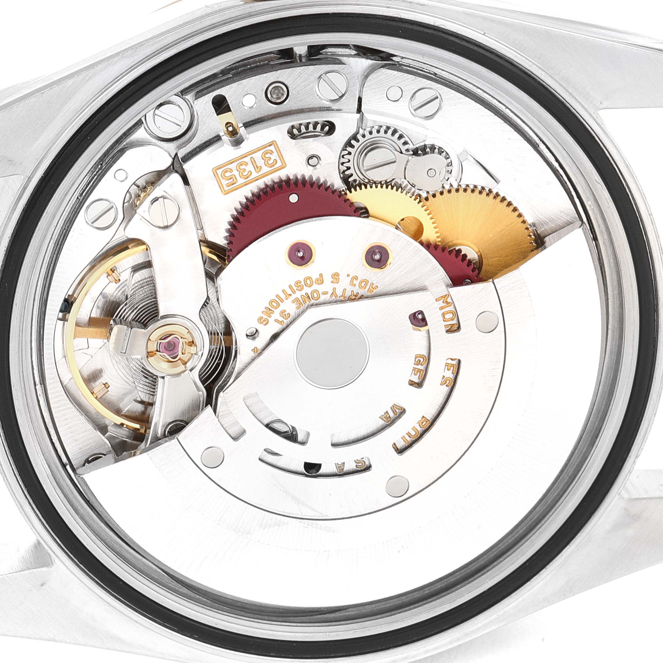 This image shows the internal mechanical movement of a Rolex Datejust 16233 Men's Steel and Gold (two tone) White Dial 16233 Men's Steel and Gold (two tone) White Dial watch from a rear angle.