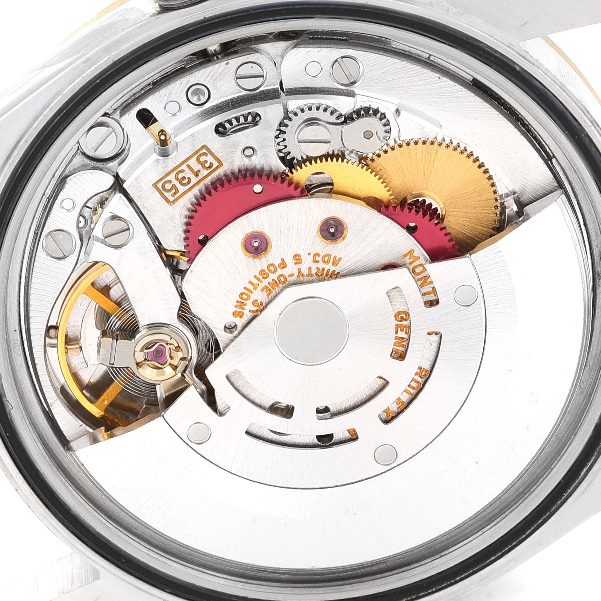 This image shows a close-up of the movement mechanism of a Rolex Datejust 16233 Men's Steel and Gold (two tone) White Dial 16233 Men's Steel and Gold (two tone) White Dial watch.