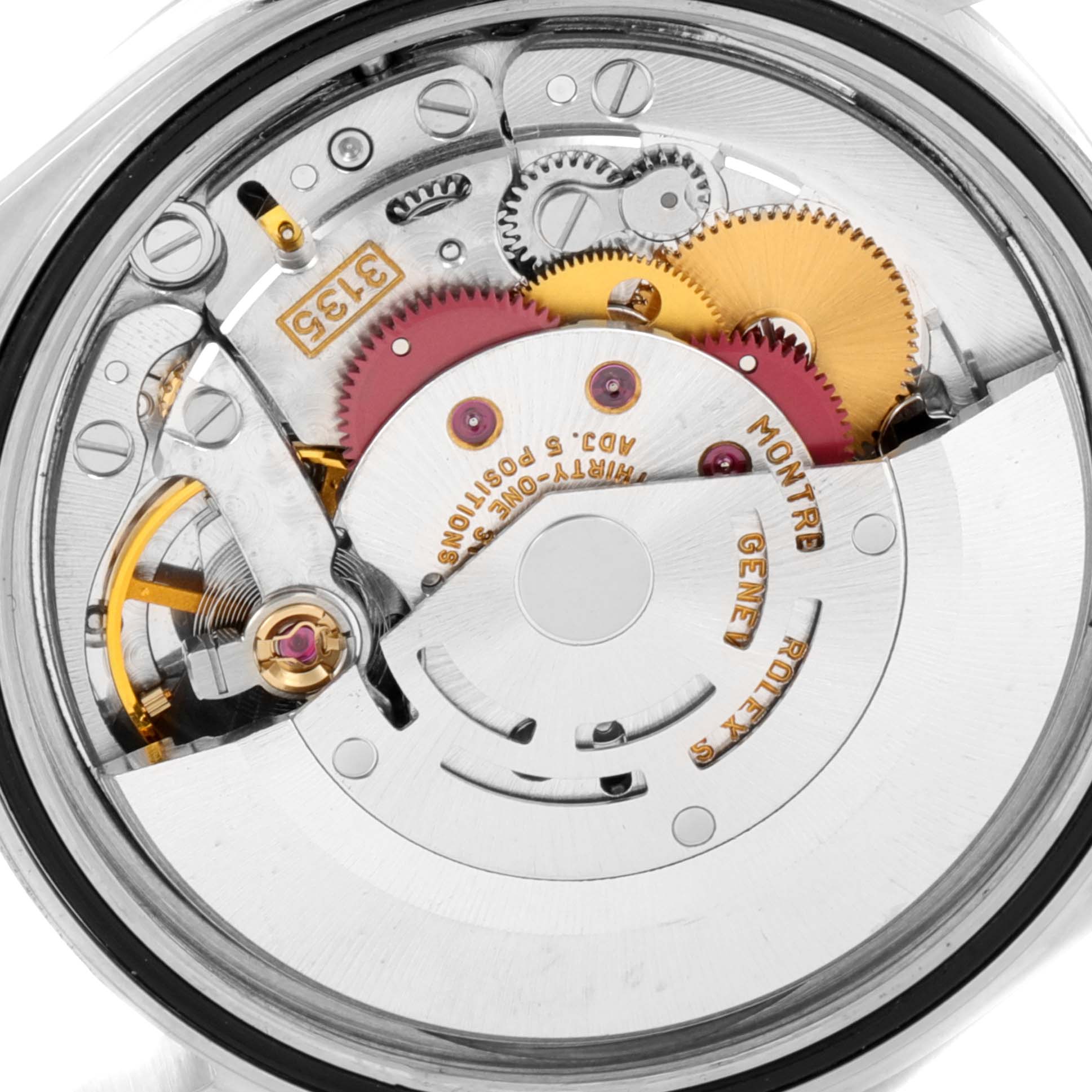 The image shows the intricate internal mechanism and gears of a Rolex Datejust 16233 Men's Steel and Gold (two tone) Champagne Dial 16233 Men's Steel and Gold (two tone) Champagne Dial watch from the back view.