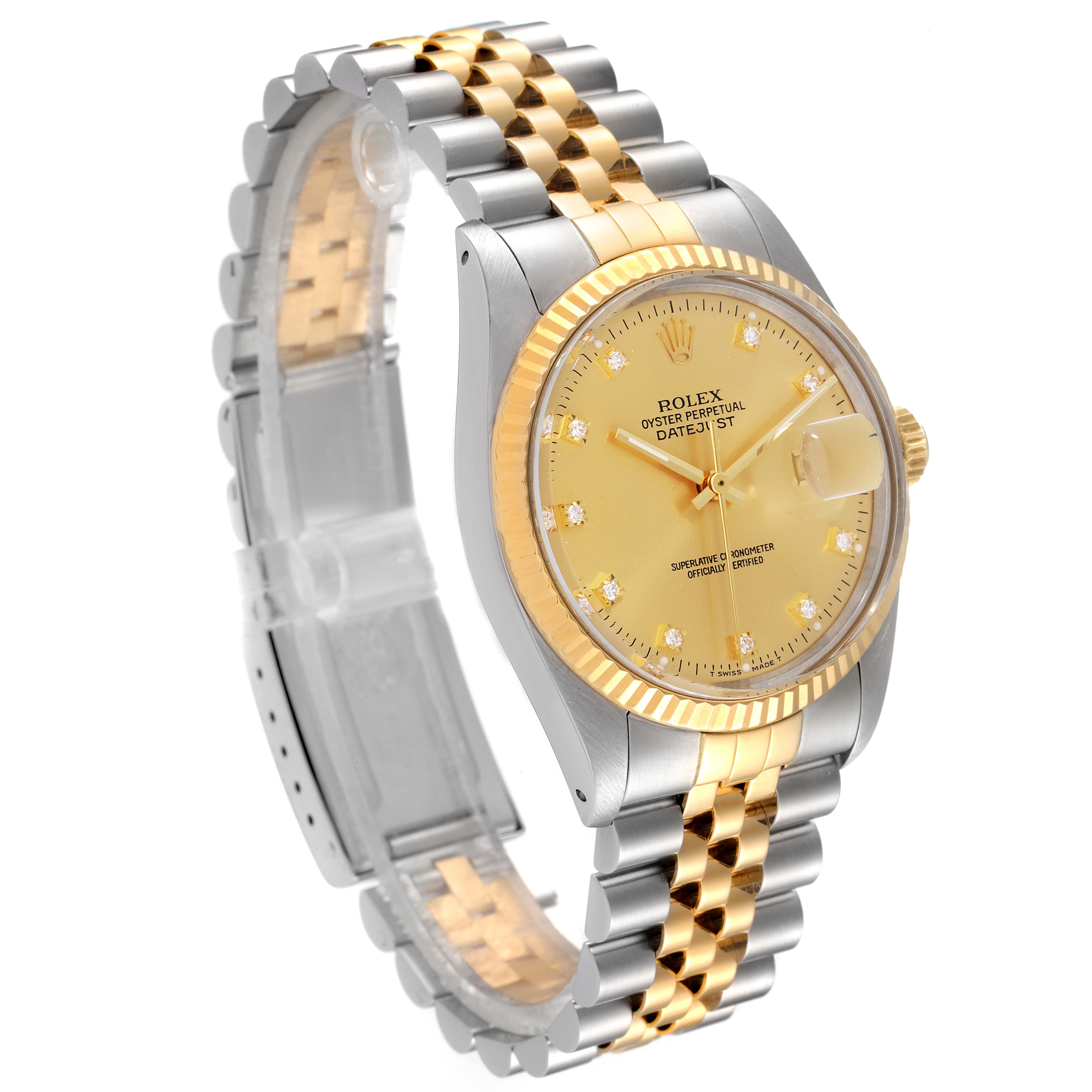 The Rolex Datejust 16013 Men
s Steel and Gold (two tone) Champagne Dial 16013 Men
s Steel and Gold (two tone) Champagne Dial watch is shown at a slight angle, displaying its gold and silver bracelet, fluted bezel, and champagne dial.