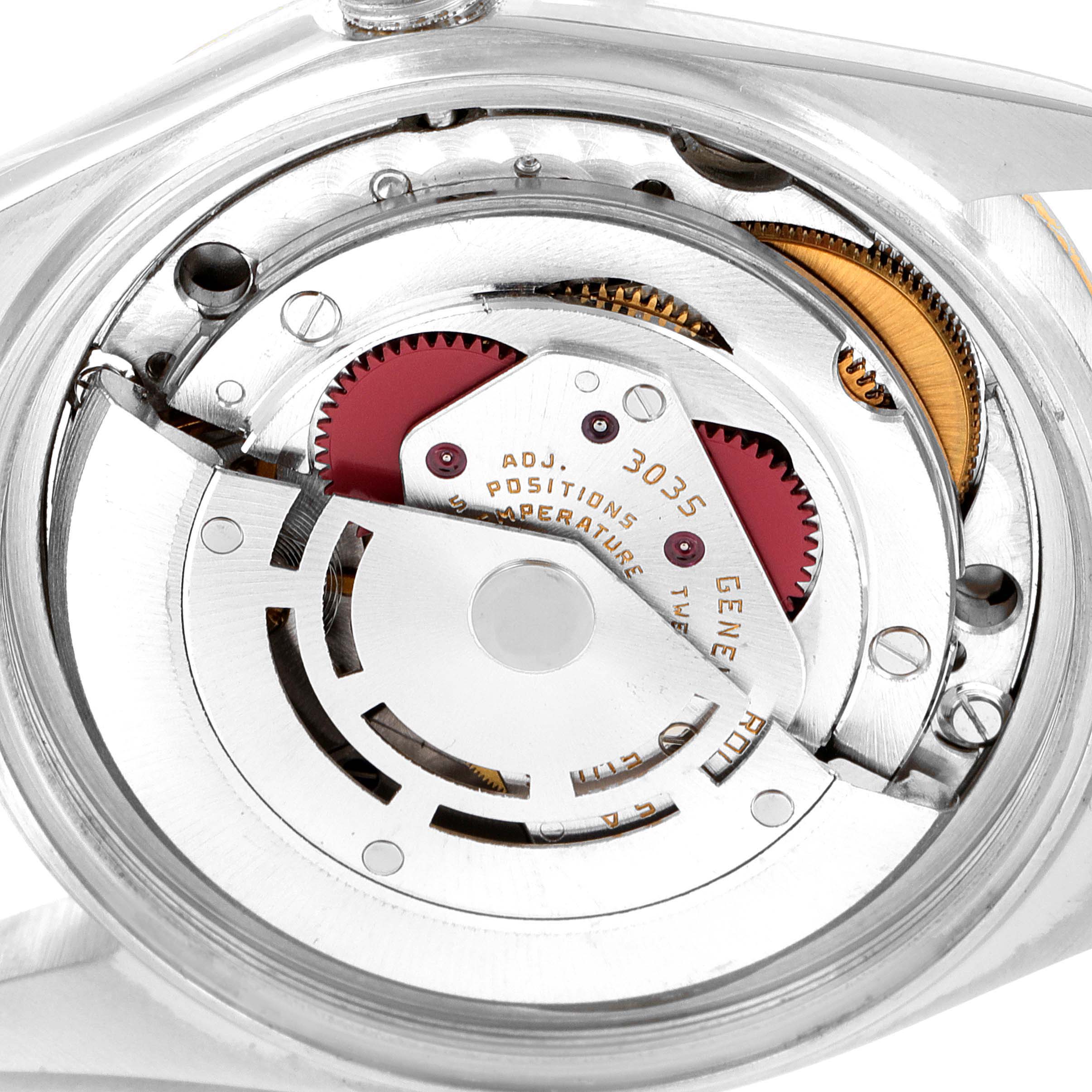 This image shows the internal mechanical movement of a Rolex Datejust 16013 Men
s Steel and Gold (two tone) Champagne Dial 16013 Men
s Steel and Gold (two tone) Champagne Dial watch, specifically the rotor and gear components.