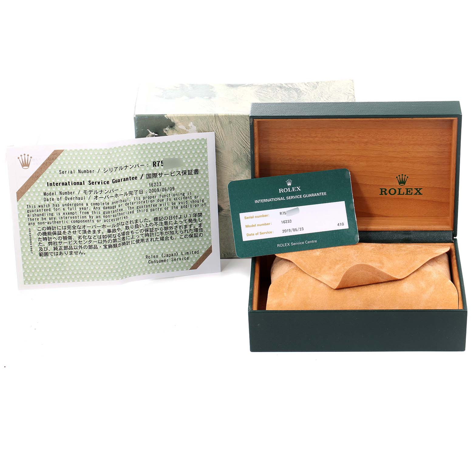 This image shows a Rolex Datejust 16233 Men's Steel and Gold (two tone) Blue Dial 16233 Men's Steel and Gold (two tone) Blue Dial box, international service guarantee card, and service paperwork from a front angle.