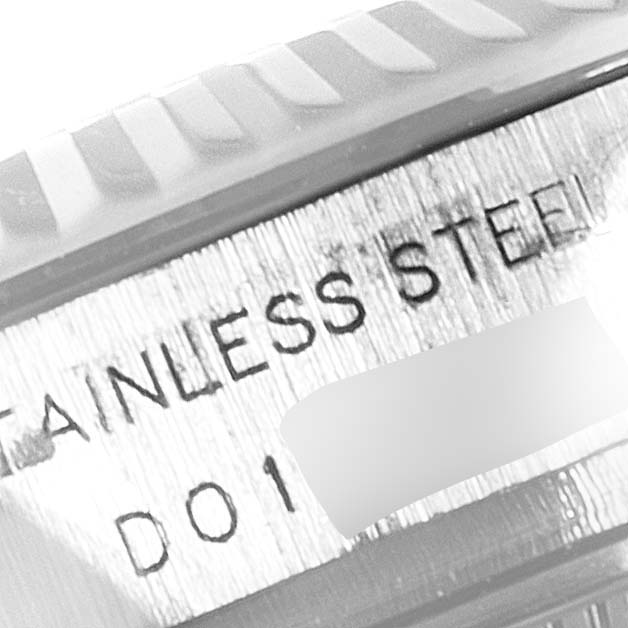 The image shows a close-up view of the edge and part of the back casing of a Rolex Datejust 179174 Women's Stainless Steel Black Dial 179174 Women's Stainless Steel Black Dial watch, showcasing "STAINLESS STEEL" text.