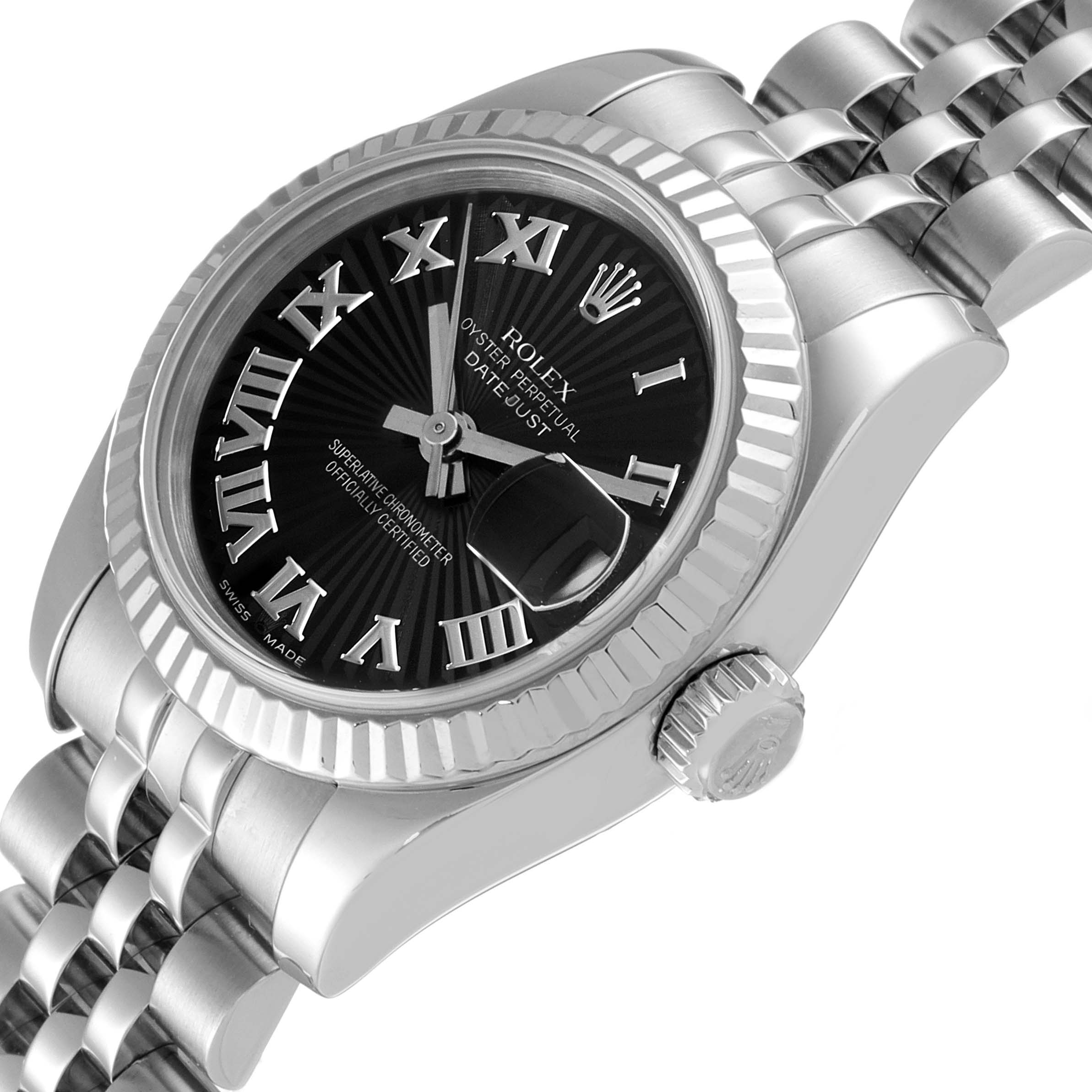 This image shows a close-up angle of a Rolex Datejust 179174 Women's Stainless Steel Black Dial 179174 Women's Stainless Steel Black Dial watch, showcasing the bezel, crown, and part of the bracelet.