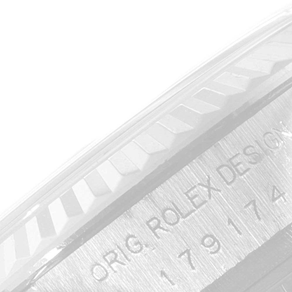 This image shows a close-up of the engraved side of the Rolex Datejust 179174 Women's Stainless Steel Pink Dial 179174 Women's Stainless Steel Pink Dial watch case.