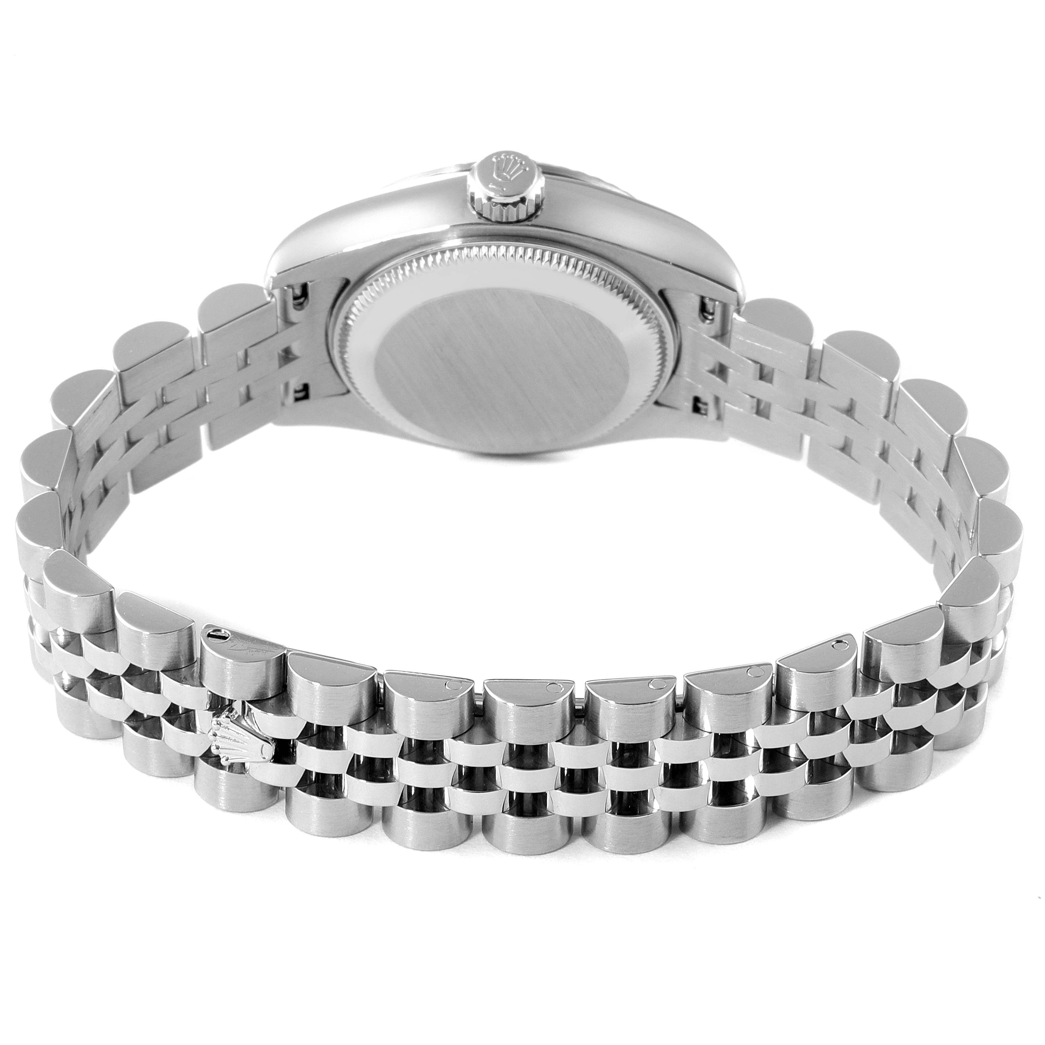 The image shows the back view of a Rolex Datejust 179174 Women
s Stainless Steel Silver Dial 179174 Women
s Stainless Steel Silver Dial watch, highlighting its case back and Jubilee bracelet.