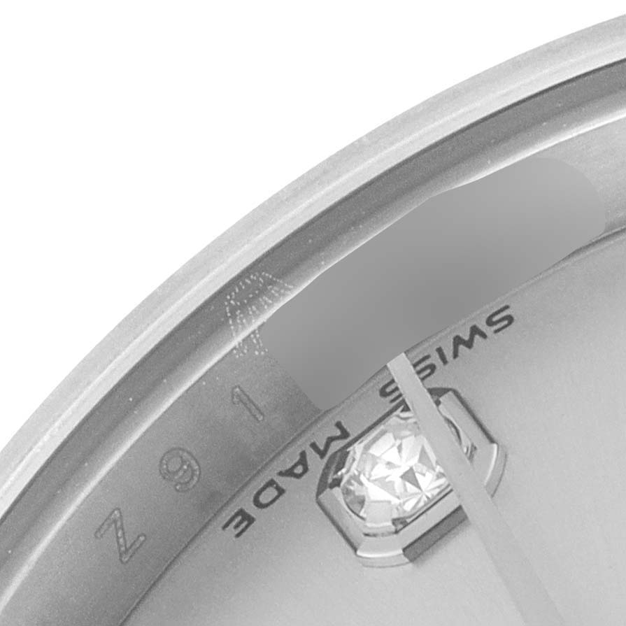 This close-up image shows part of the dial and inner bezel of a Rolex Datejust 179174 Women
s Stainless Steel Silver Dial 179174 Women
s Stainless Steel Silver Dial watch.