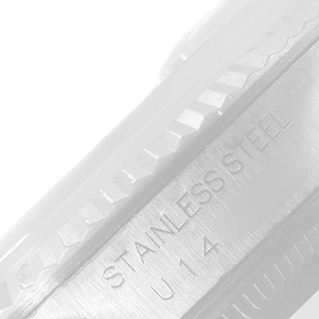 The image shows a close-up view of the stainless steel bezel and side casing of a Rolex Datejust 16234 Men's Stainless Steel Silver Dial 16234 Men's Stainless Steel Silver Dial watch.