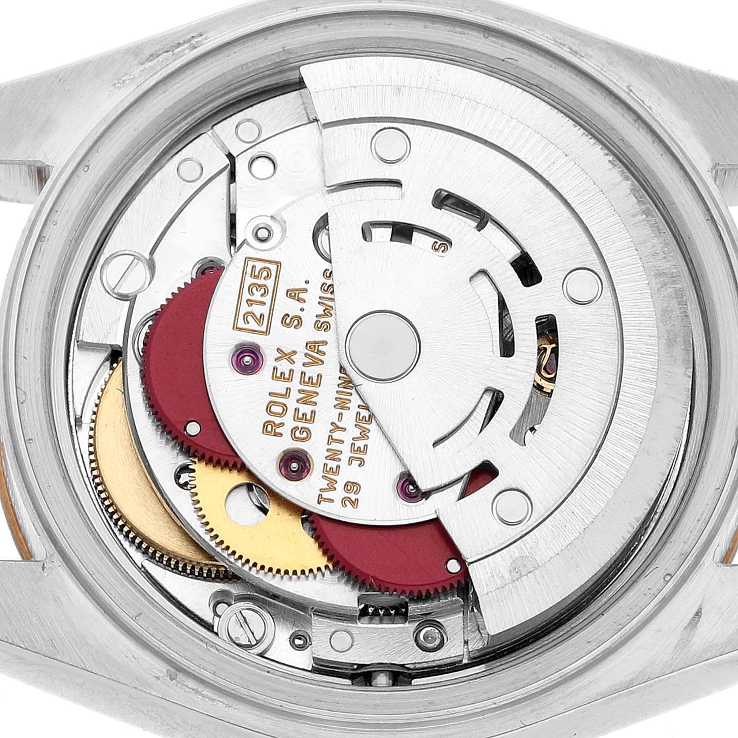 The image shows the movement of a Rolex Datejust 69173 Women's Steel and Gold (two tone) Black Dial watch from a back angle, highlighting its intricate components.